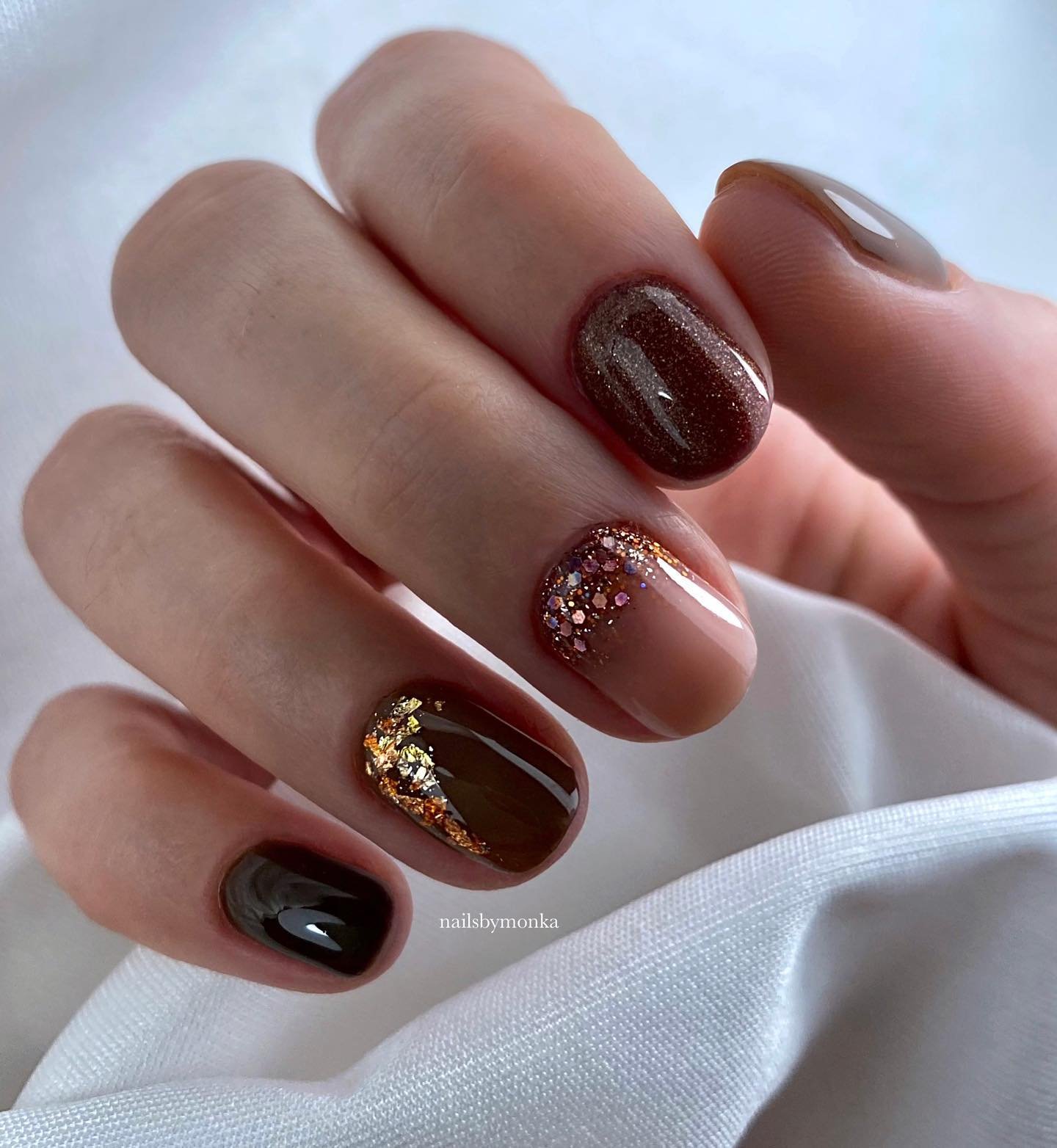 Short Deep Burgundy Nails with Glitter and Gold Accents