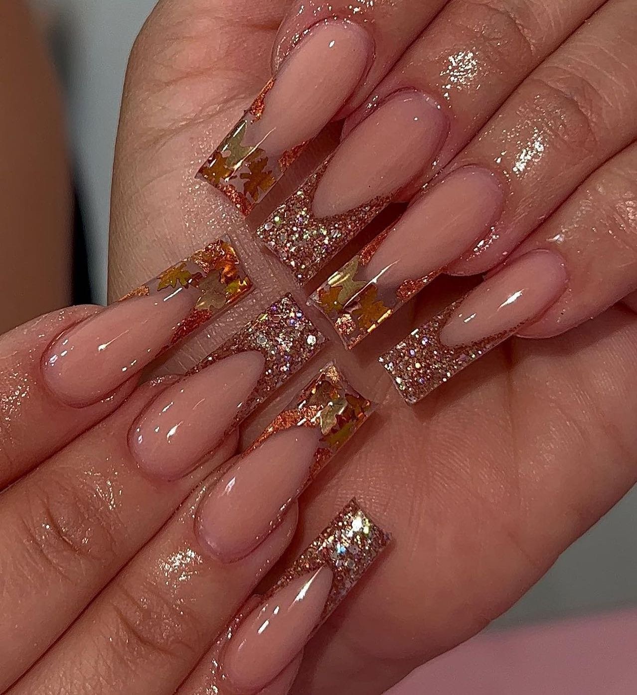 Pink Glitter Almond Nails with Layered Gold Details