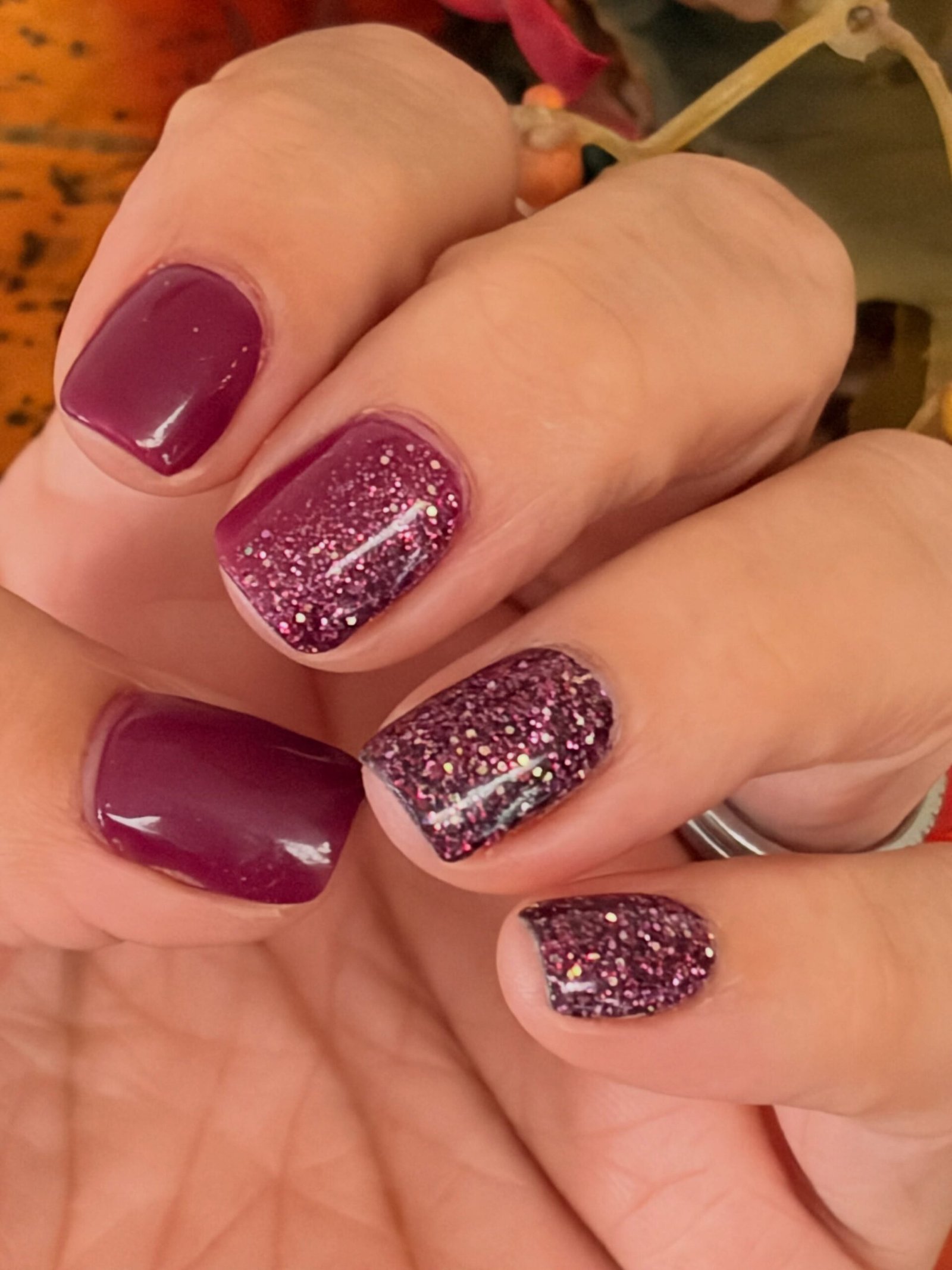 Plum Nails with Sparkly Pink Glitter Accents
