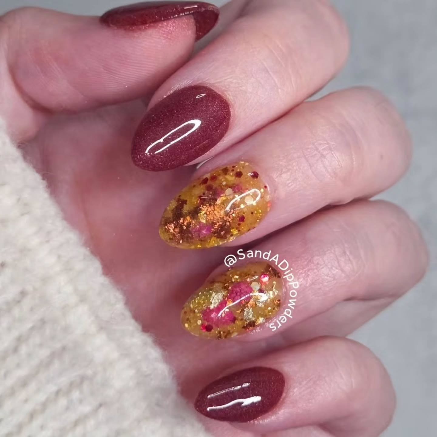 Plum Nails with Gold Glitter Encapsulated Accents