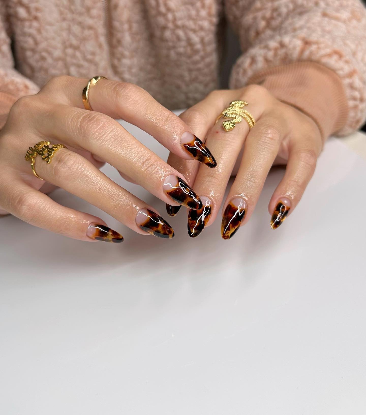 Nude Almond Nails with Tortoiseshell and Orange Accents