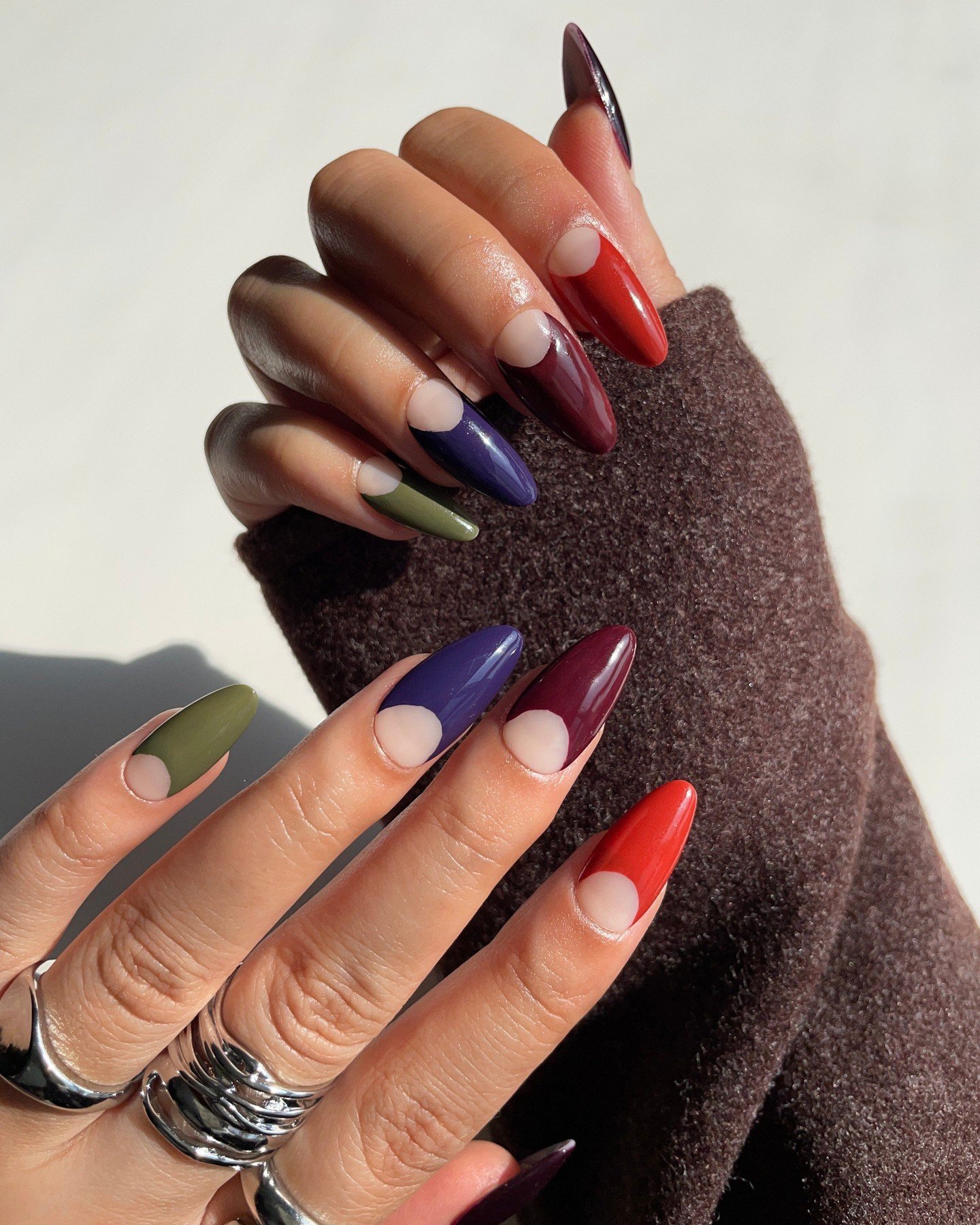 Multicolor Almond Nails with Nude Half-Moon Cutouts