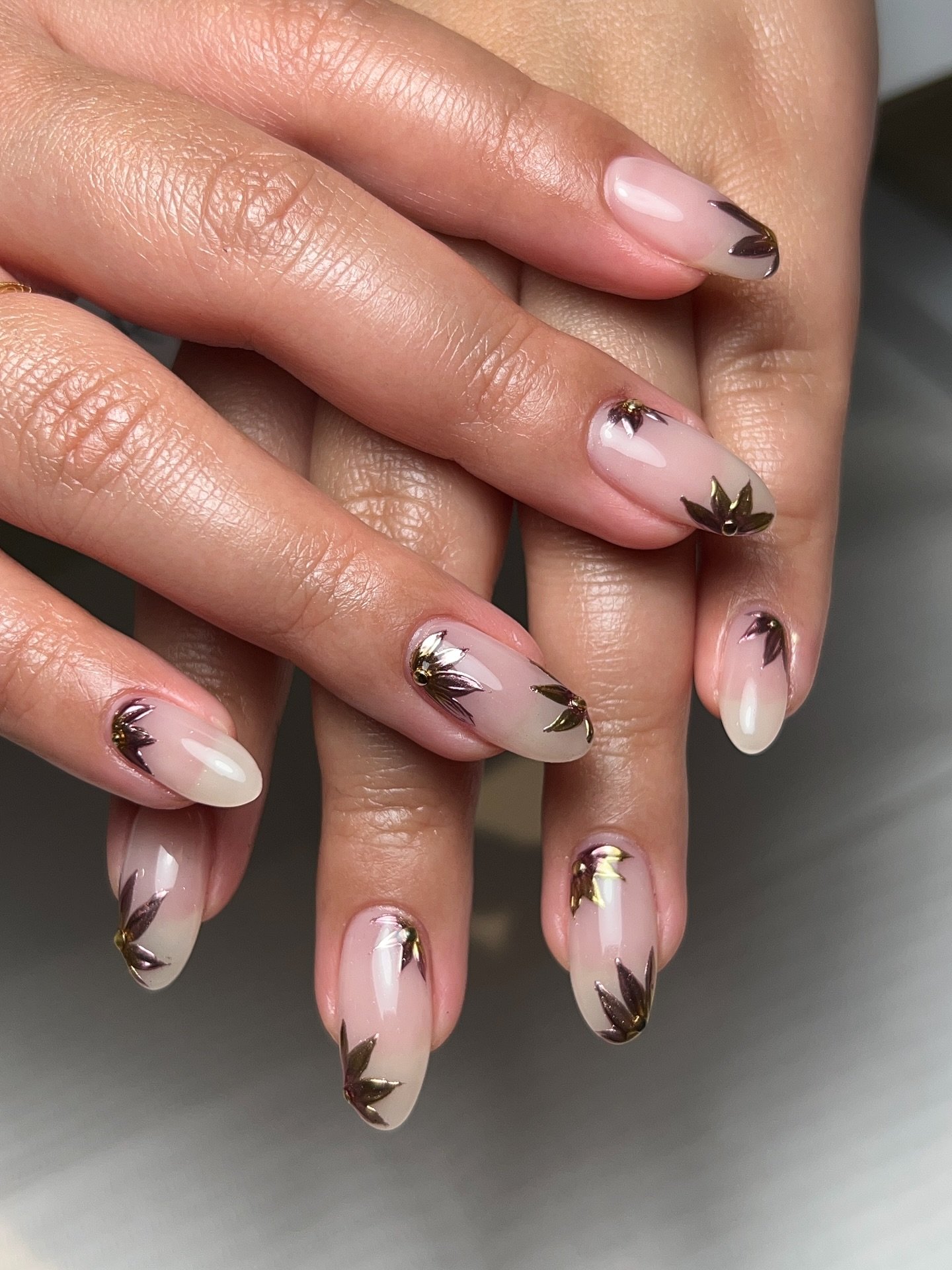 Short Nude Nails with Brown and Gold Metallic Accents