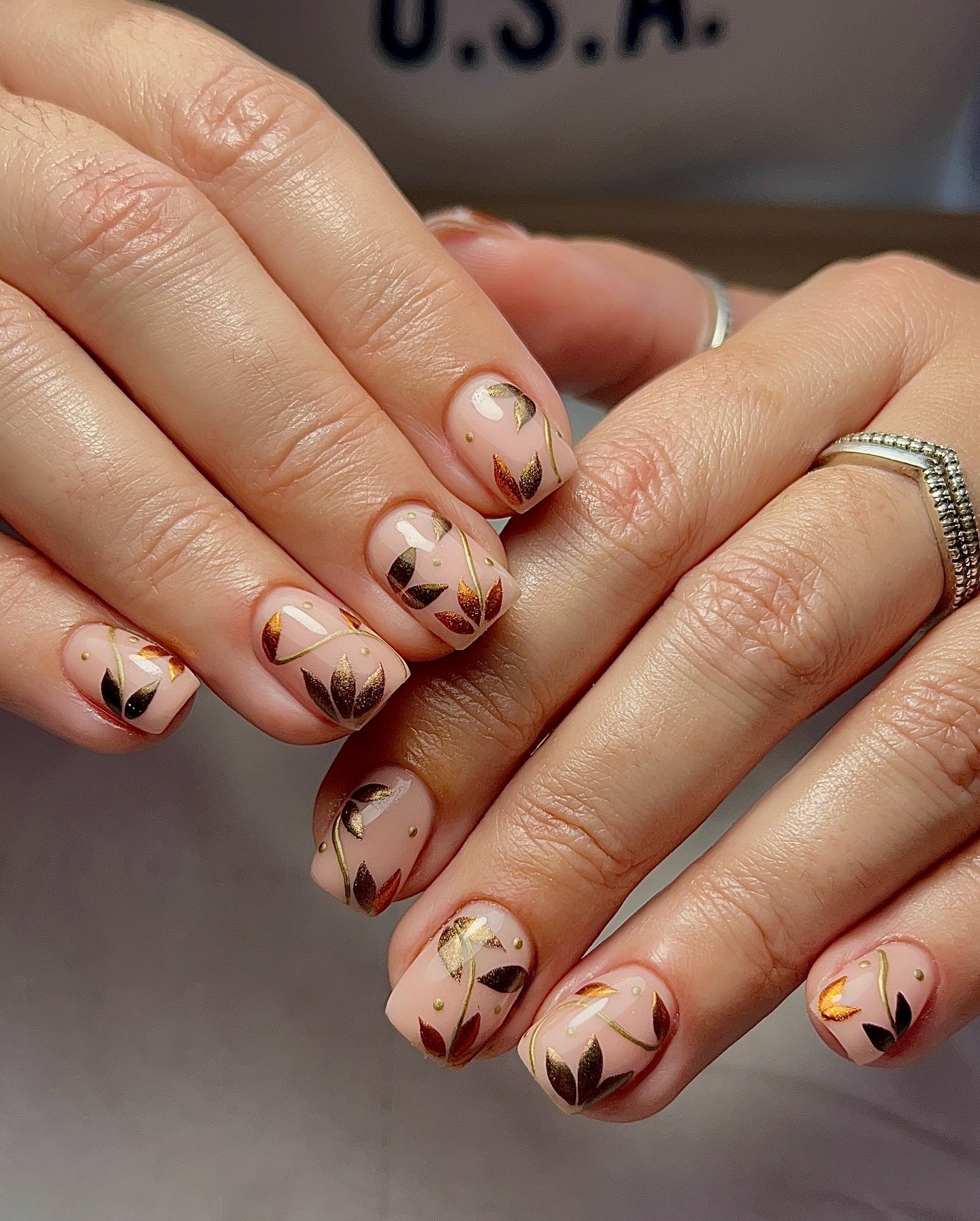 Nude Nails with Copper Tips and Tiny Brown Details