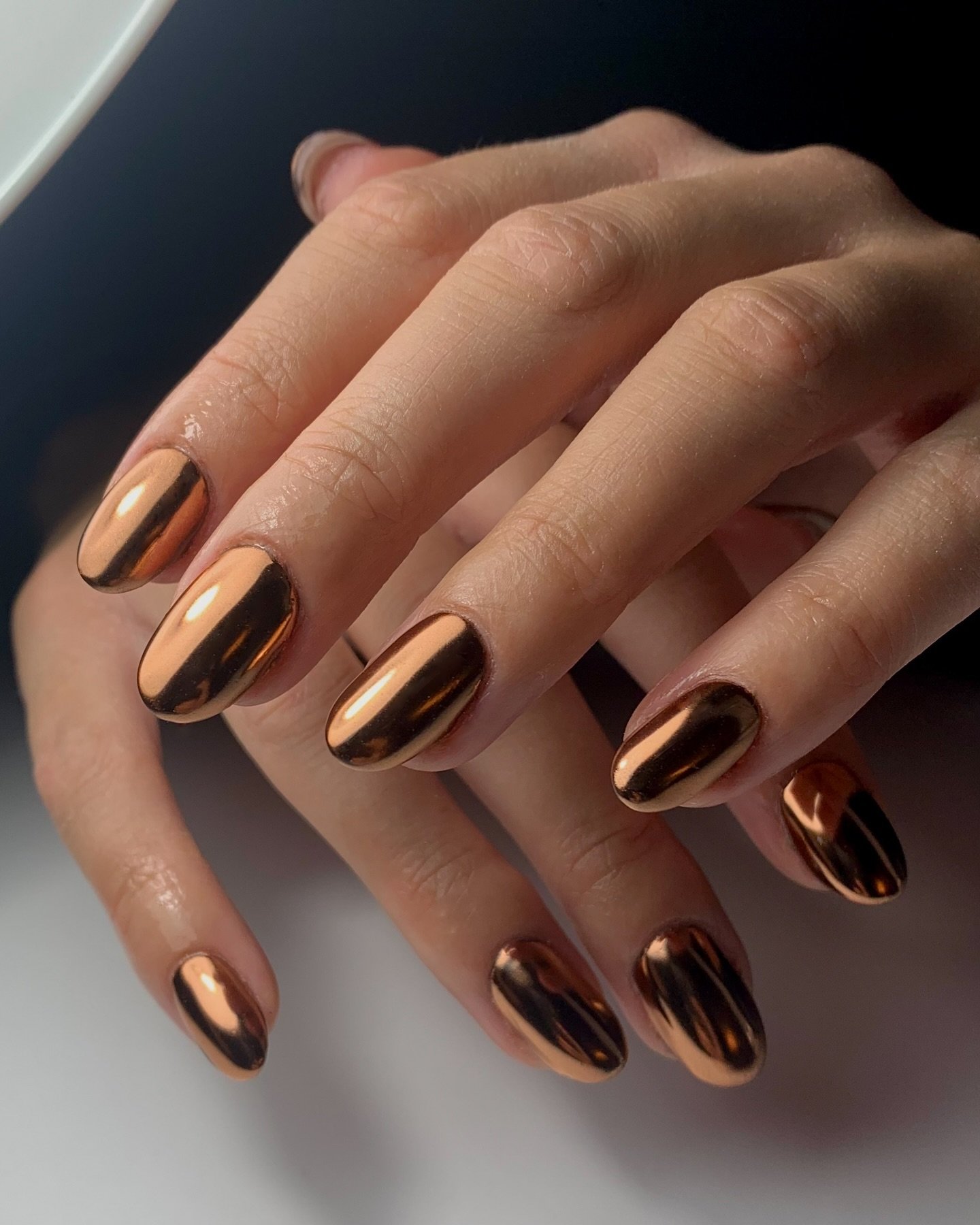 Glossy Bronze Almond Nails