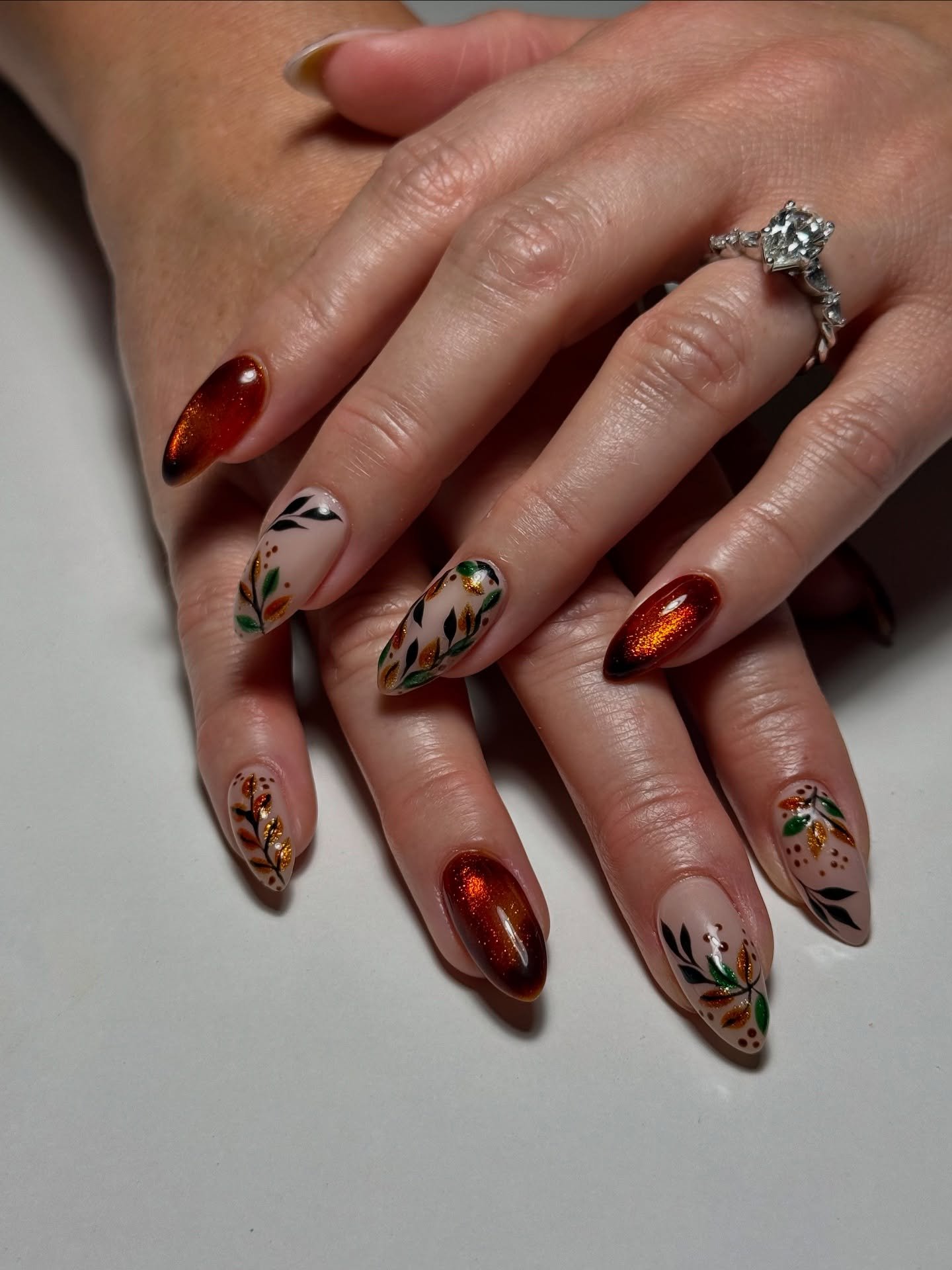 Deep Brown Metallic Nails with Fine Gold Details