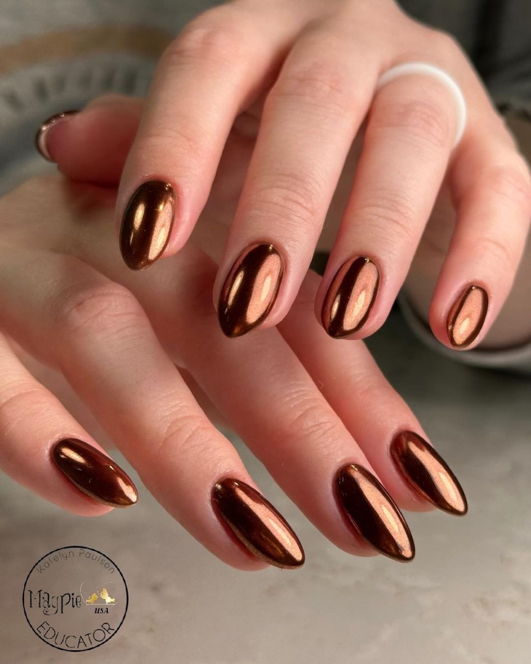 Glossy Copper Chrome Almond Nails