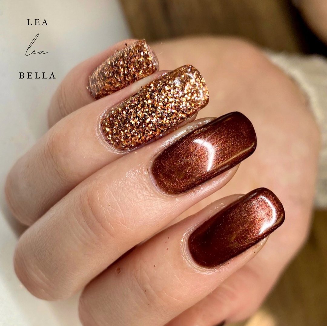 Brown Chrome Nails with Glitter and Copper Accents