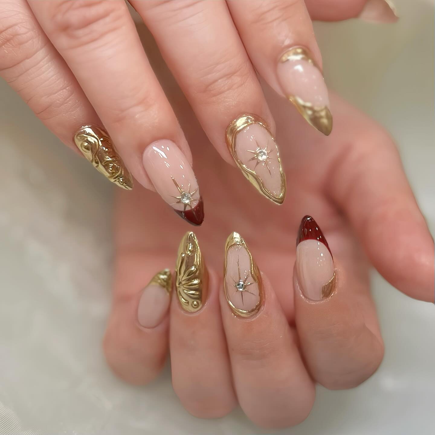 Nude Nails with Gold Glitter and Delicate Details