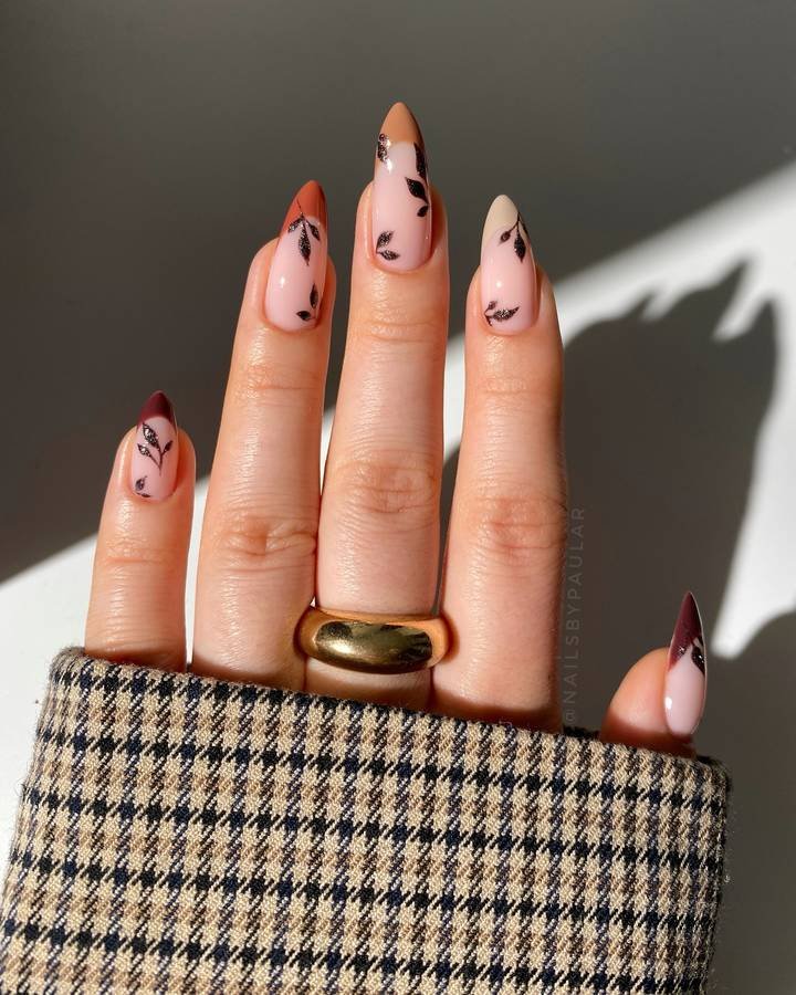Soft Pink Almond Nails with Tiny Black Accents
