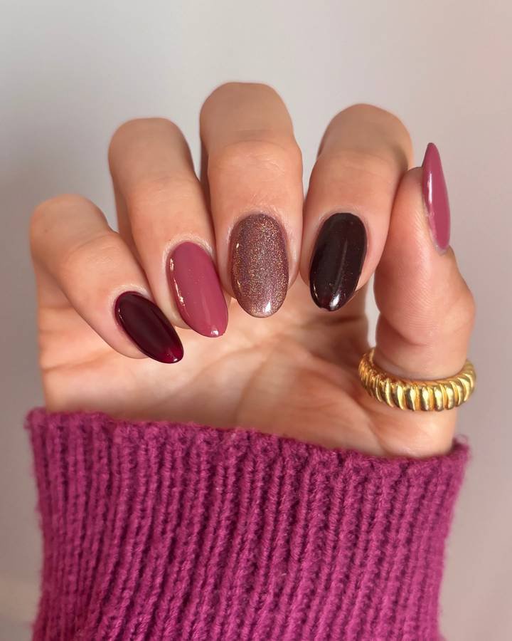Berry and Brown Nails with a Glitter Accent