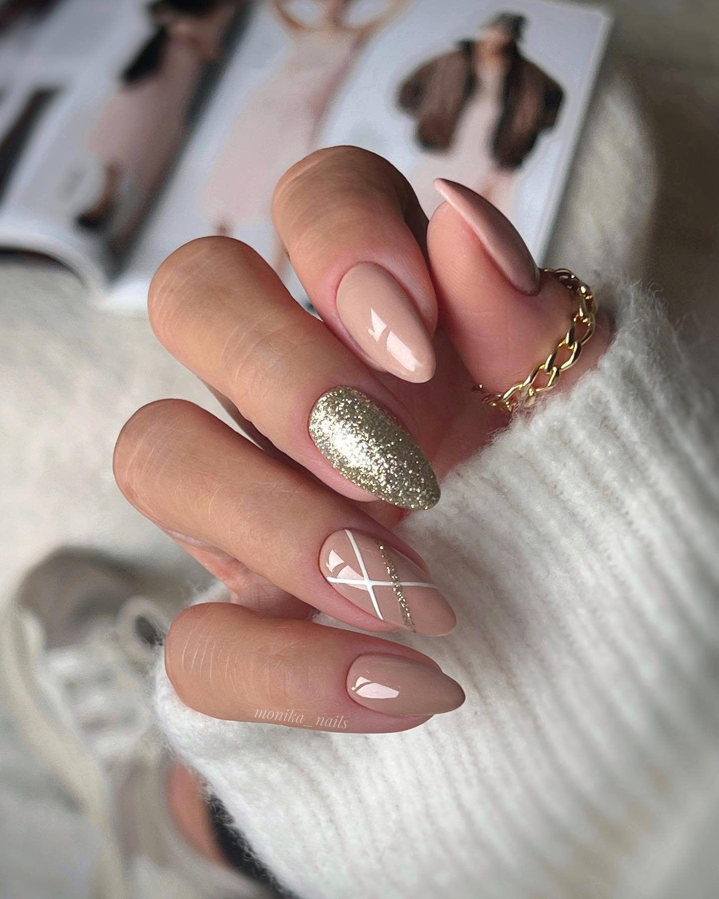 Soft Nude Almond Nails with Silver Glitter Accents