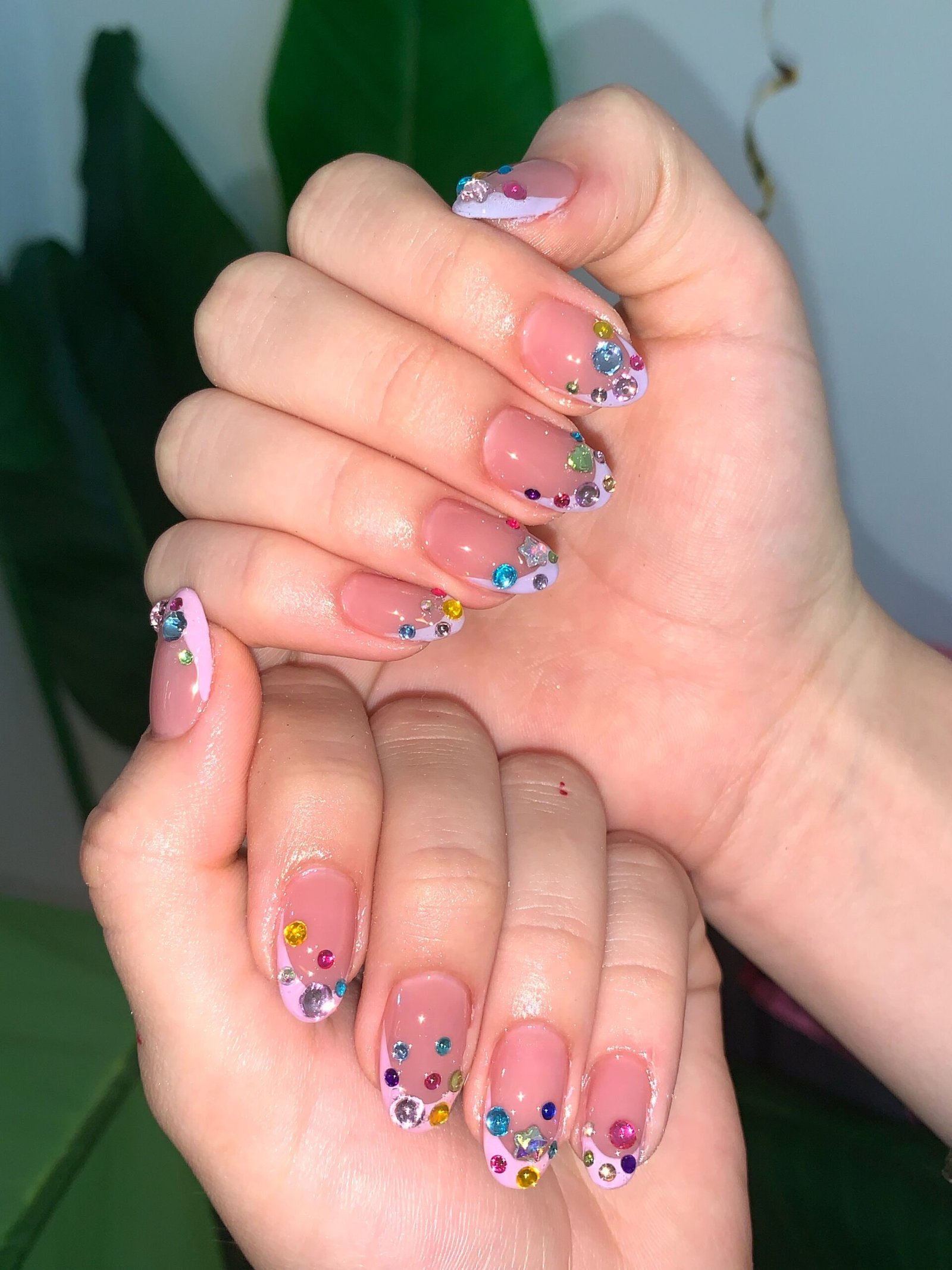Colorful Pink Nails with Small Floral-Like and Gem Details