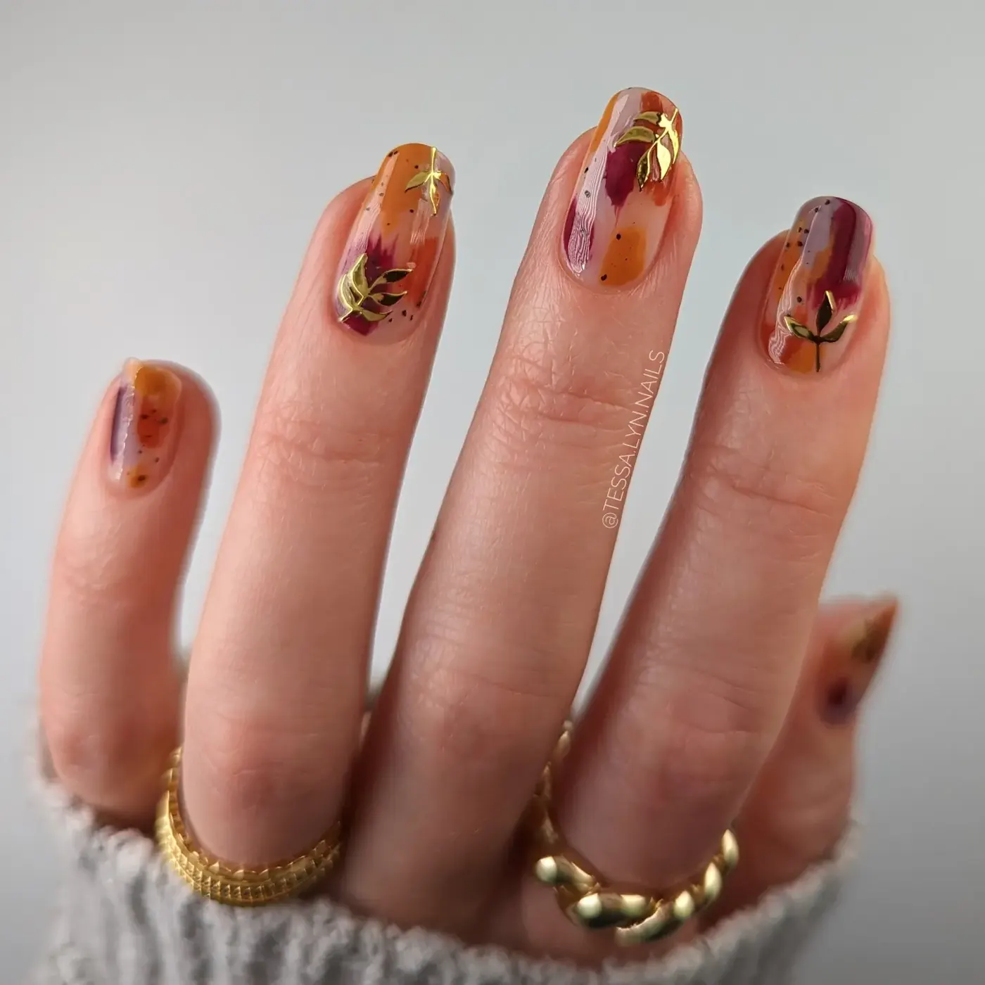 Warm Sheer Nails with Brown and Orange Leaf Details