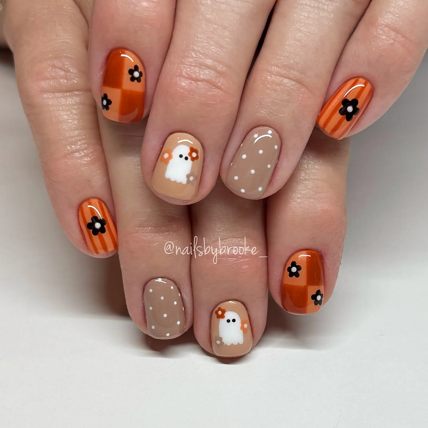 Orange and Taupe Nails with Small Flower Accents