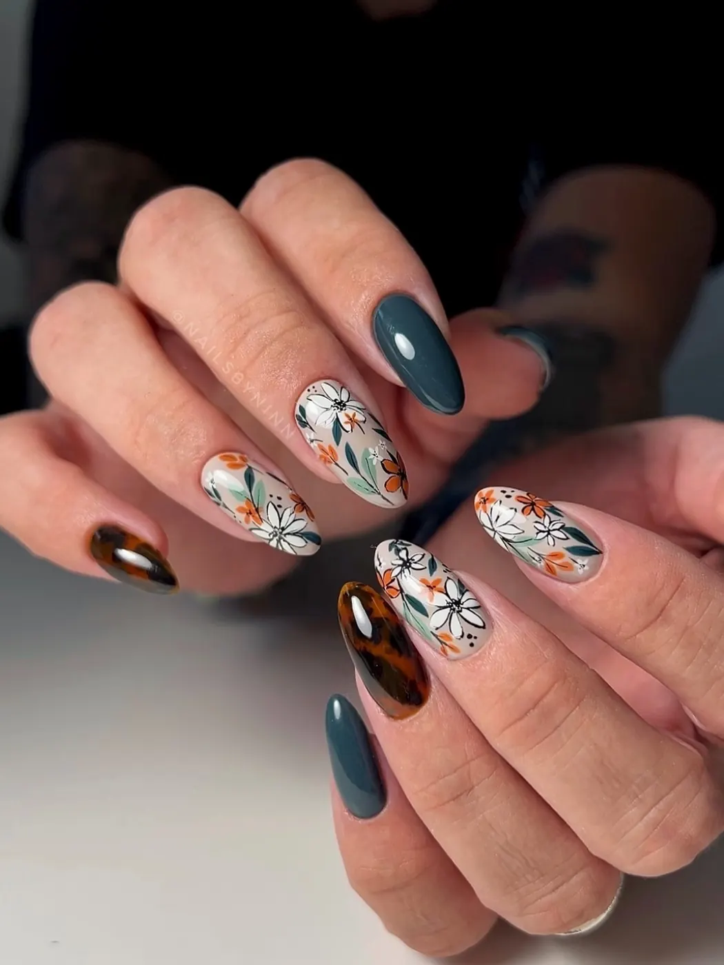 Teal and Brown Nails with Floral and Speckled Details