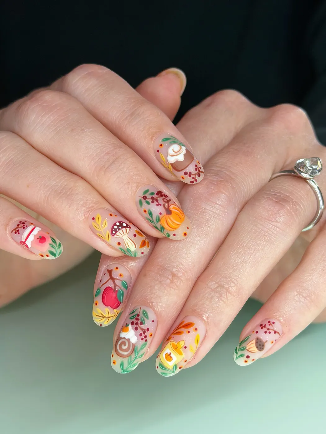 Colorful Floral Mix Nails with Green and Orange Accents