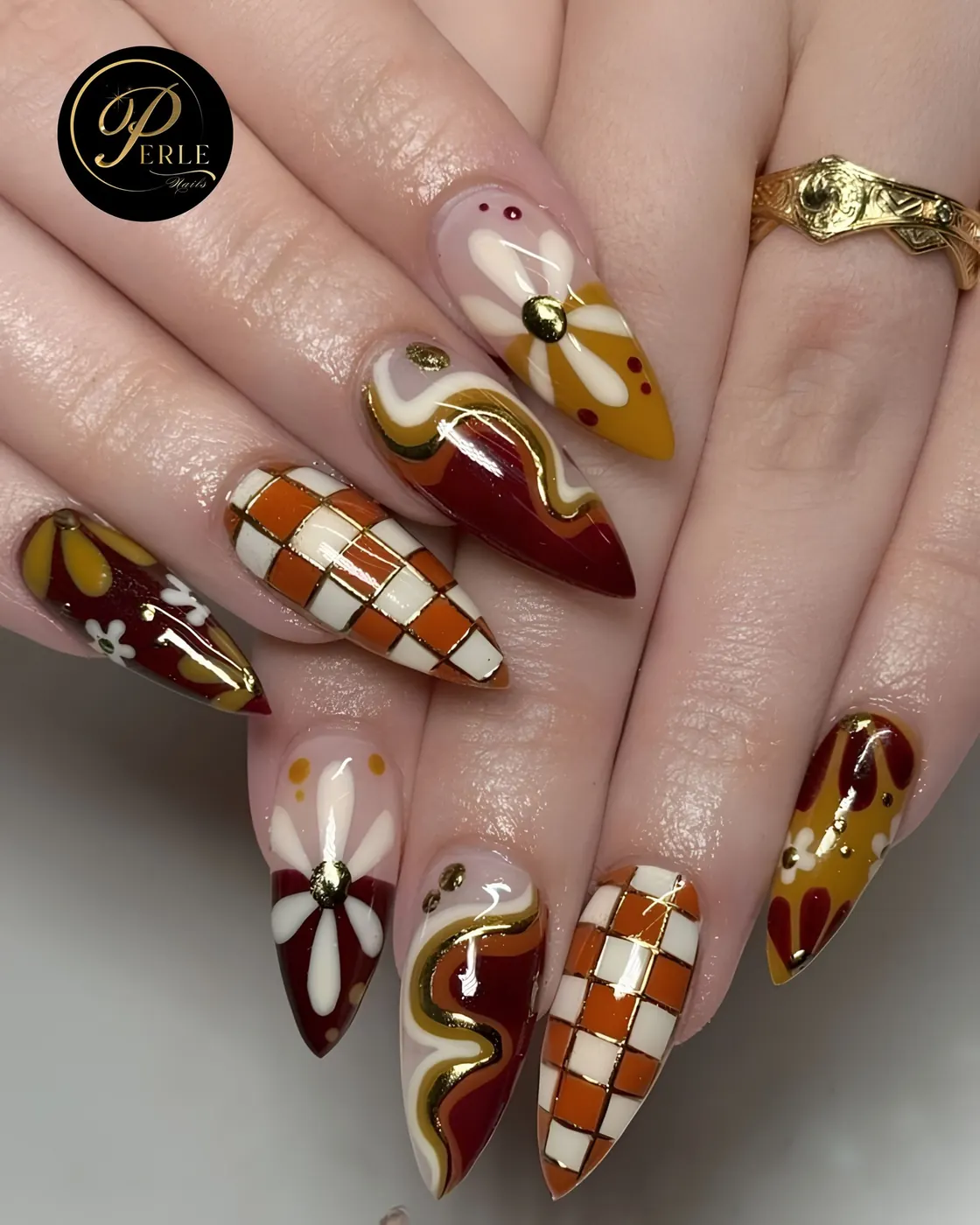 Brown, Cream, and Gold Mixed Pattern Nails