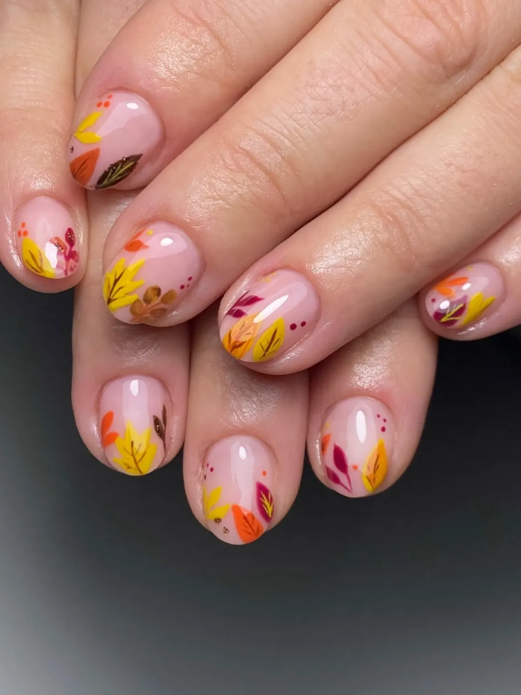 Sheer Pink Nails with Bright Orange Floral Details