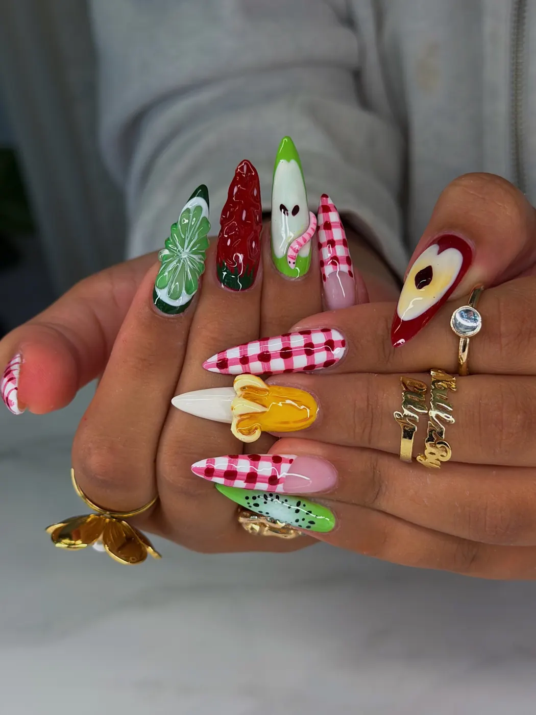Colorful Long Nails with Checks, Stripes, and Floral Motifs