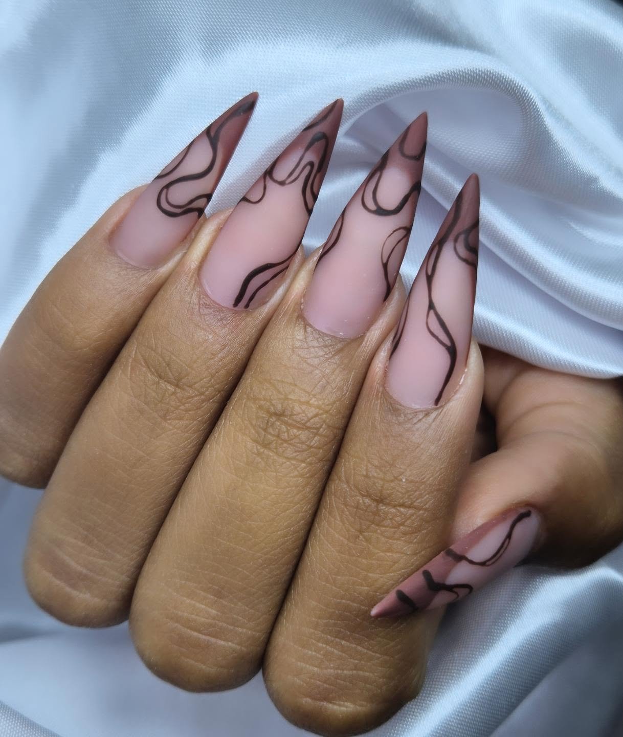 Blush Pink Stiletto Nails with Brown Swirls