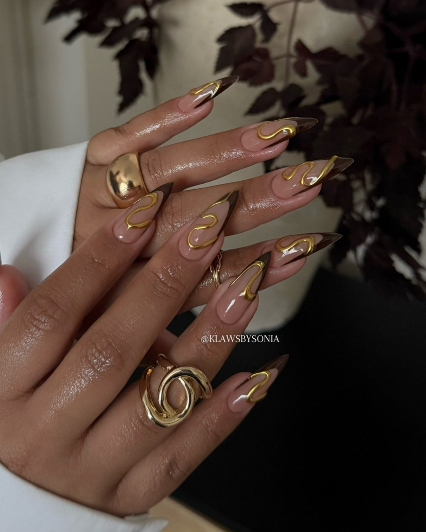 Sheer Nude Stiletto Nails with Gold Line Details