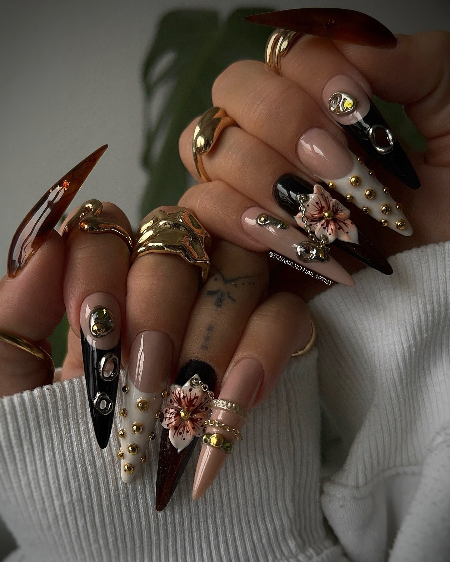 Brown and Black Stiletto Nails with 3D Floral Details