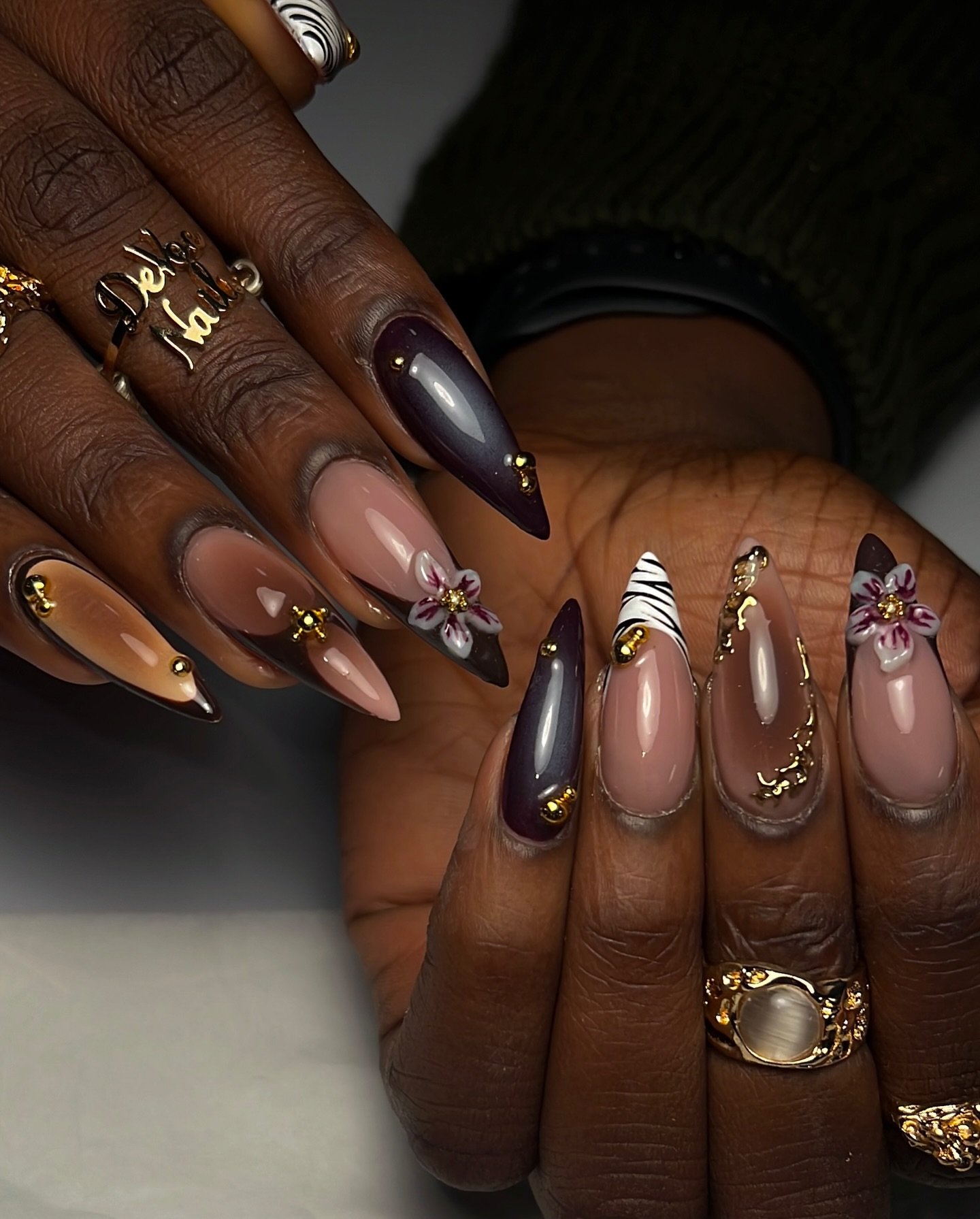 Dark Brown and Gold Stiletto Nails with Embellishments