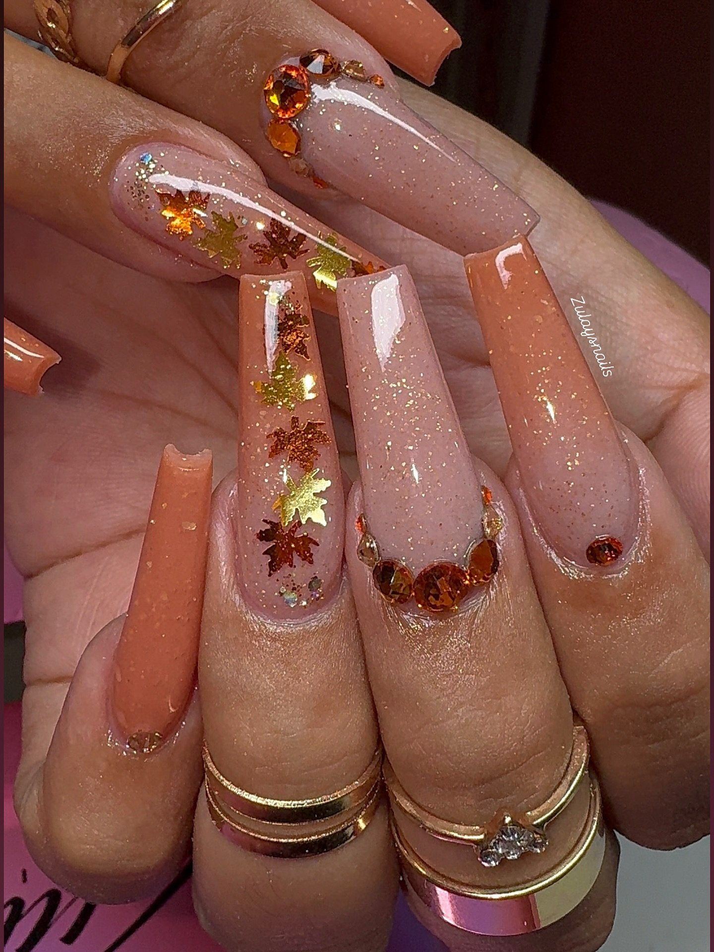 Sheer Pink Stiletto Nails with Gold and Floral Accents