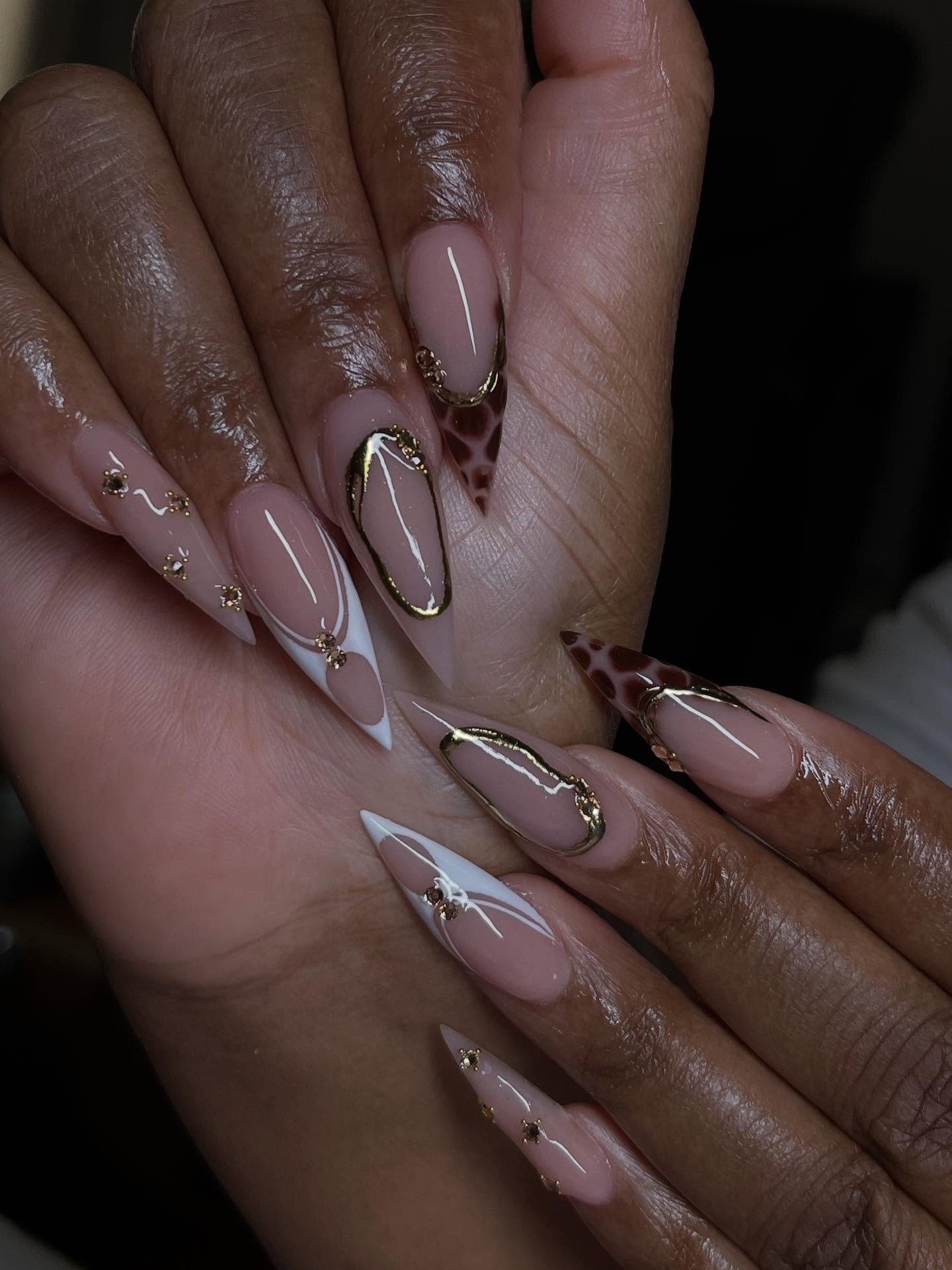 Sheer Nude Stiletto Nails with Delicate Metallic Lines