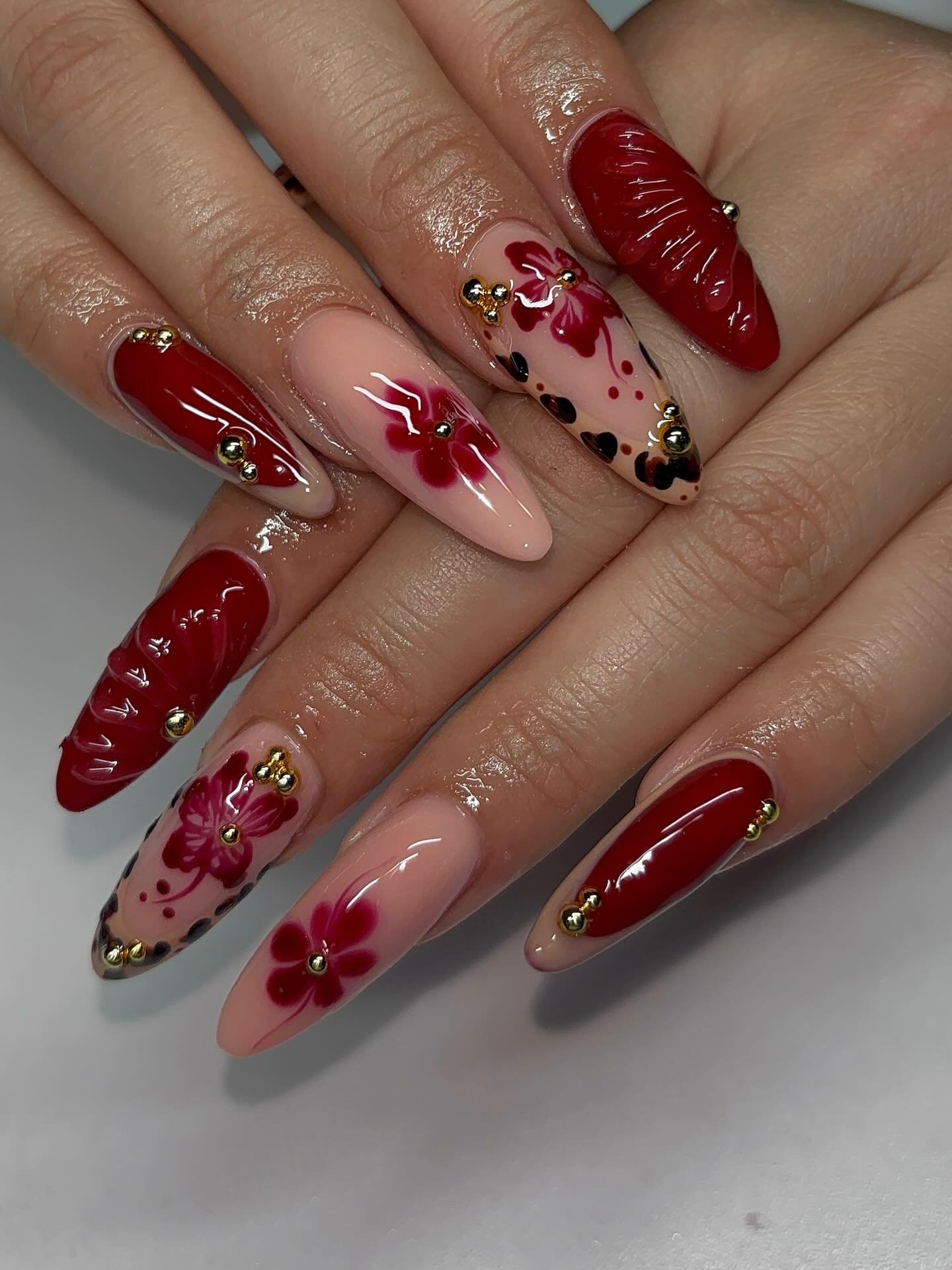 Pink Floral Nails with Gold Accents