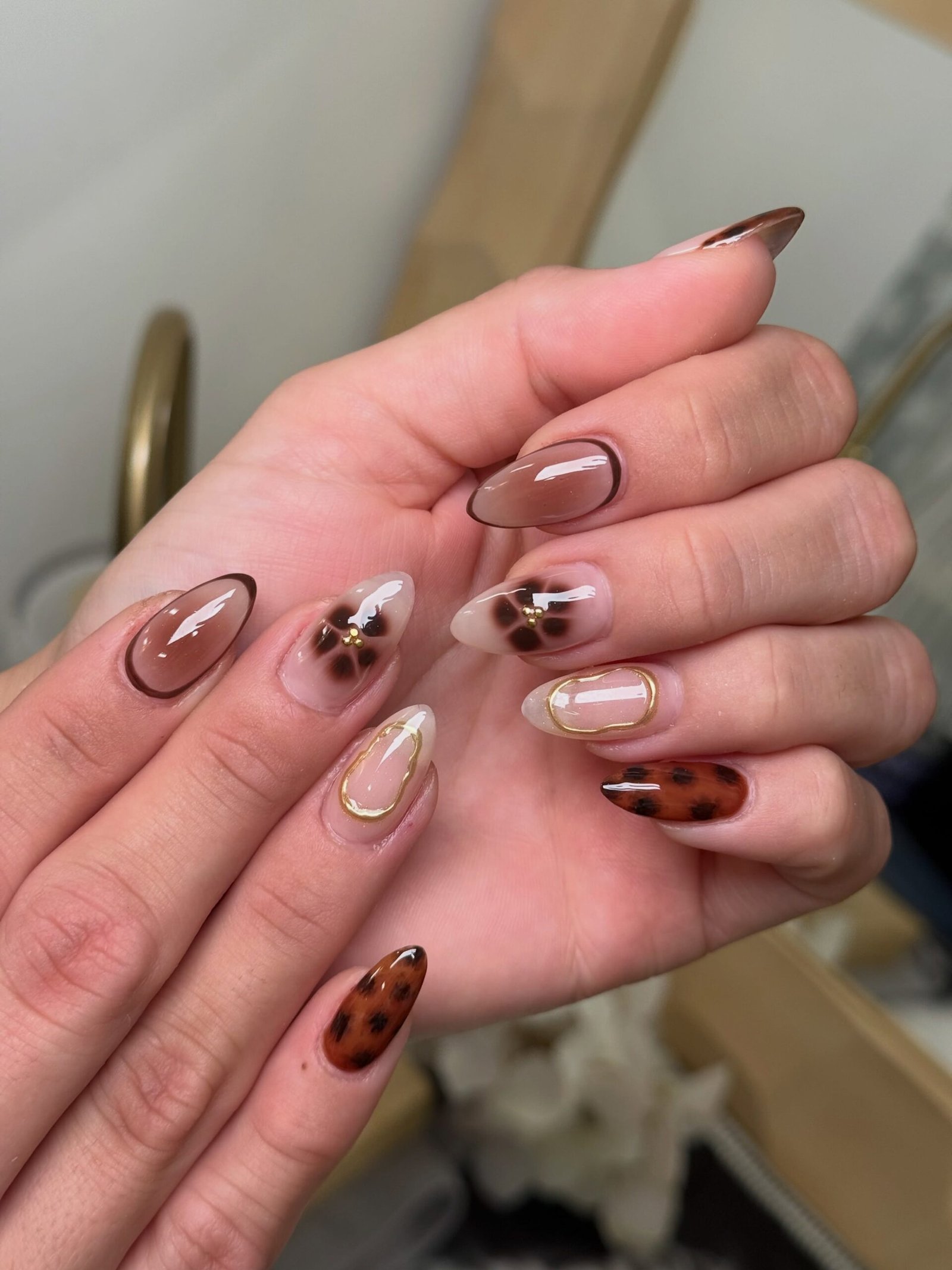 Red Floral and Patterned Almond Nails