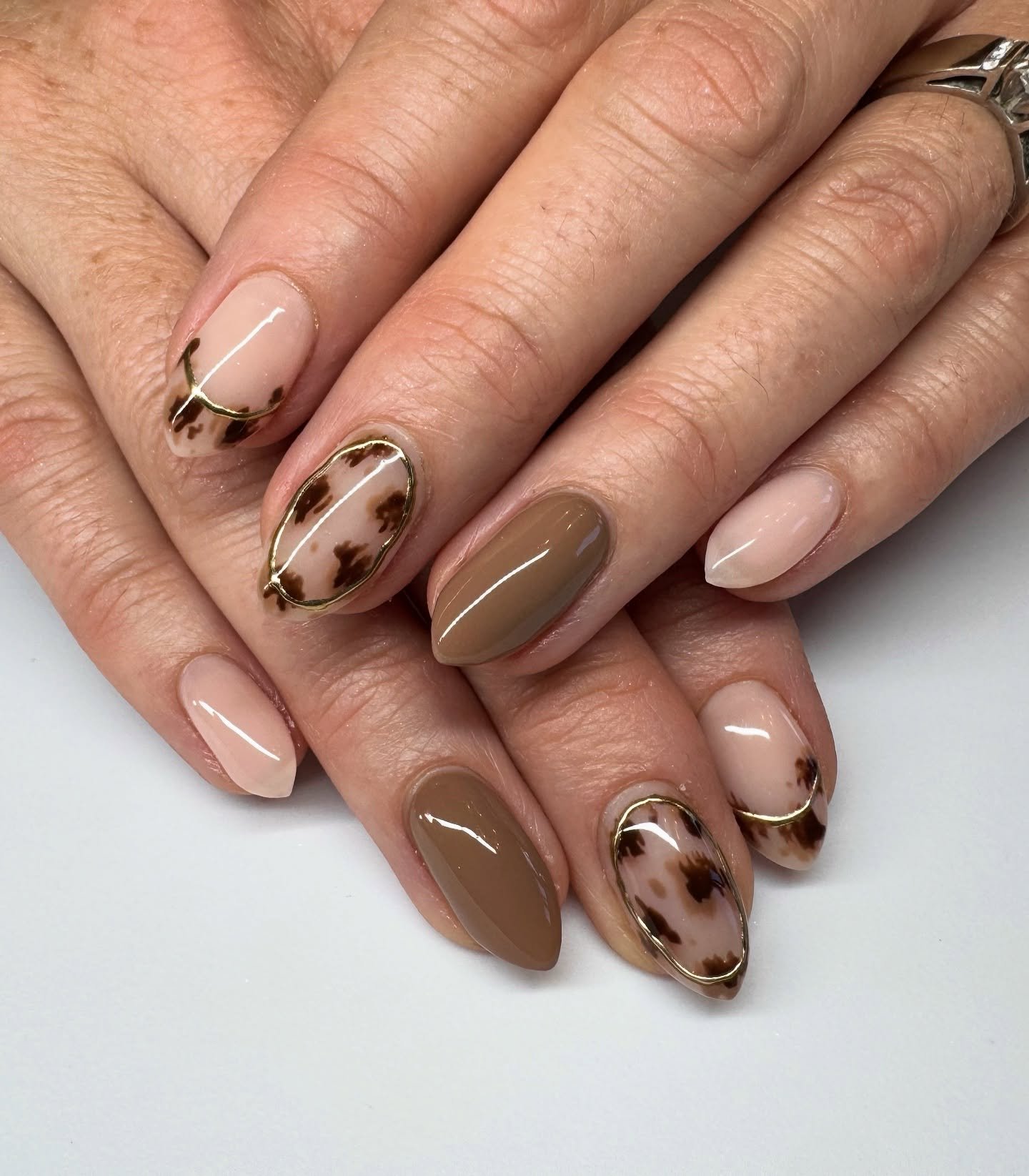 Pink Nails with Brown French Tips and Gold Details
