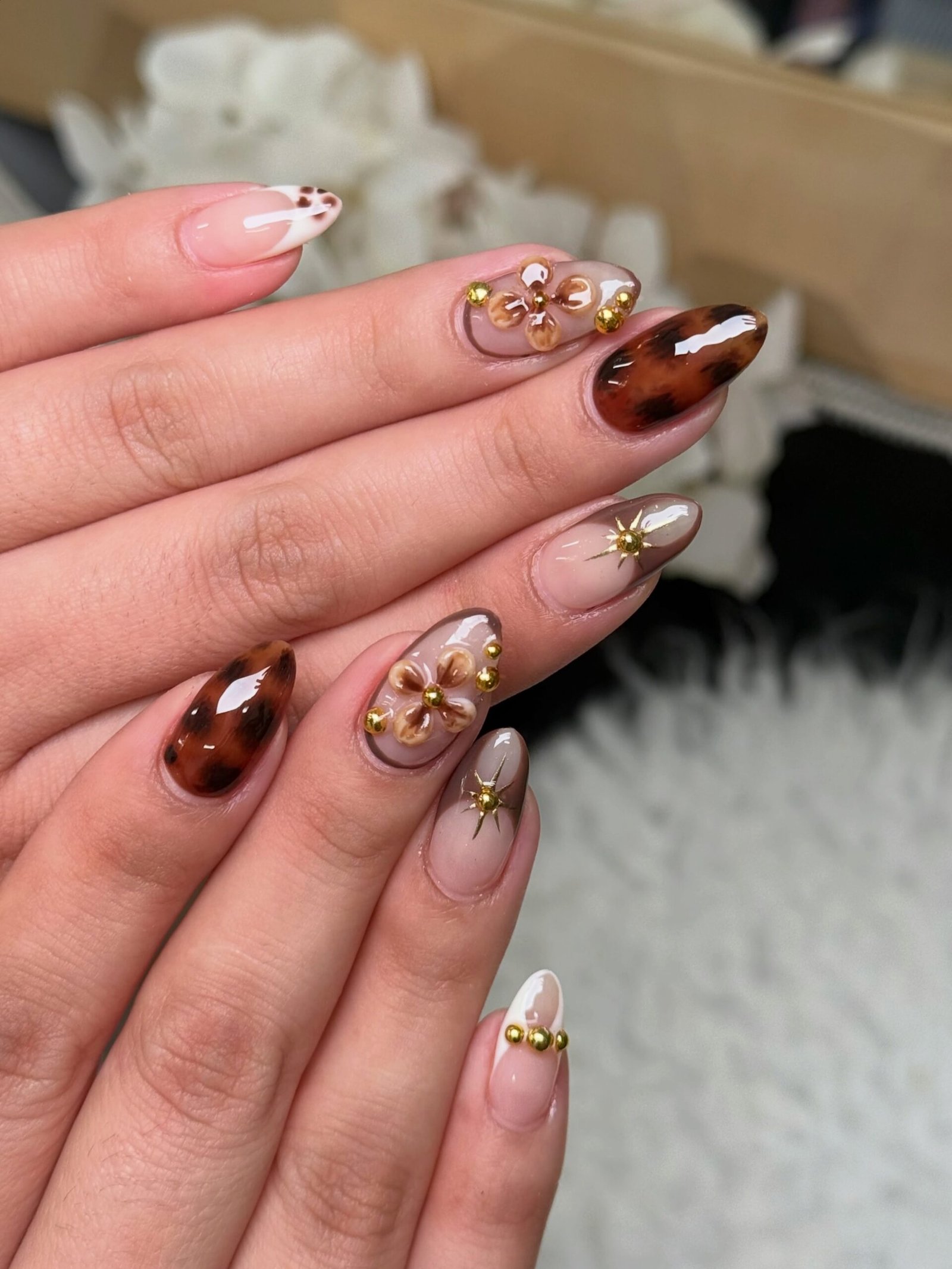 Sheer Pink Nails with Brown French Tips and Gold Details