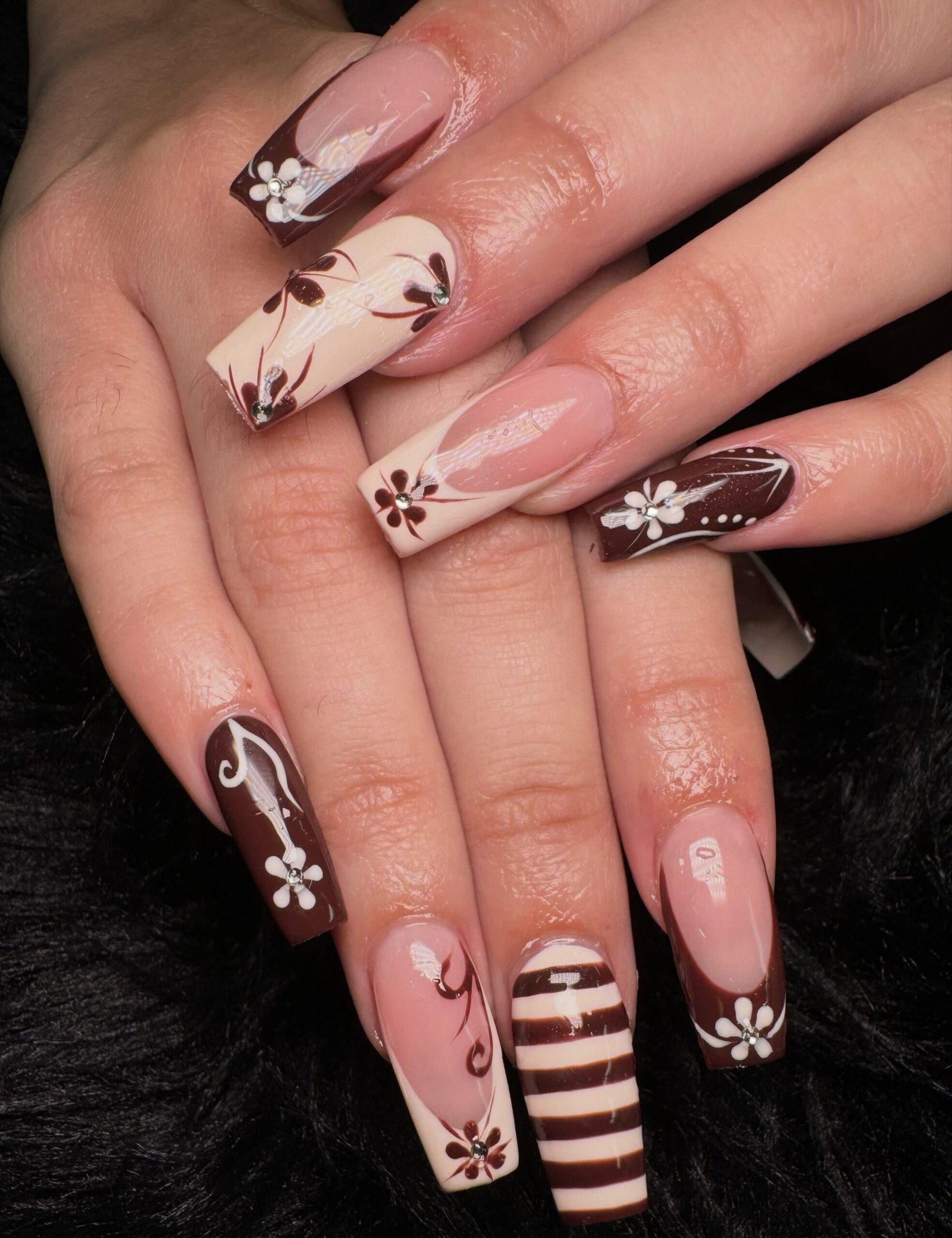 Blush Almond Nails with Brown Floral and Stripe Details