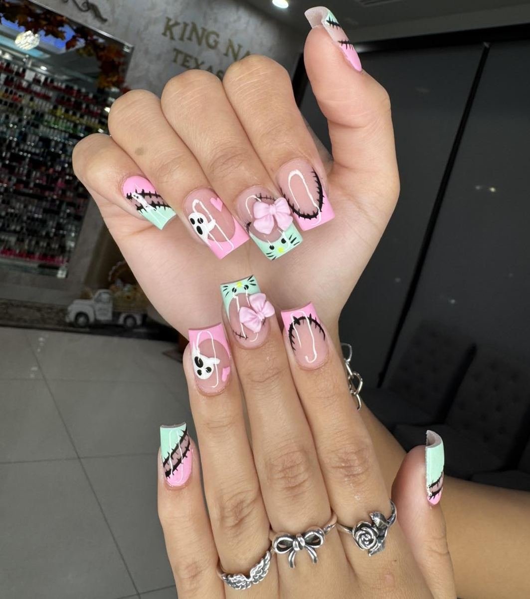 Pink Halloween Character Coffin Nails — DP6pNBJCPVOKingnailstexascity.jpg