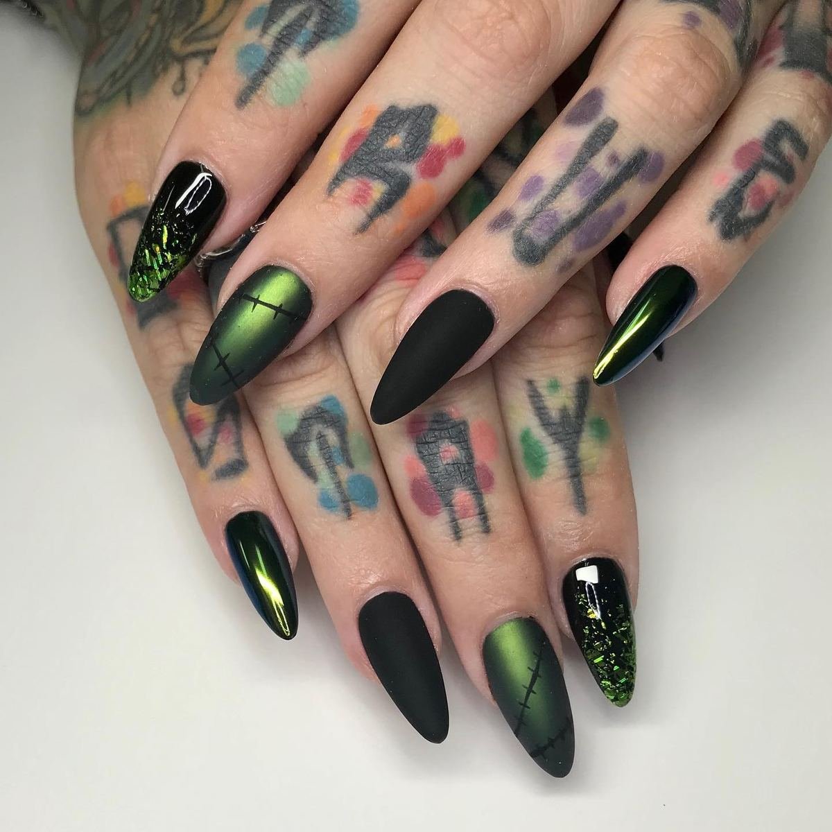 Matte Black and Green Stitched Almond Nails — B4T0EHRnsyrMars - Nail Artist KokoistUSA Educator Detailed Manicuring.jpg