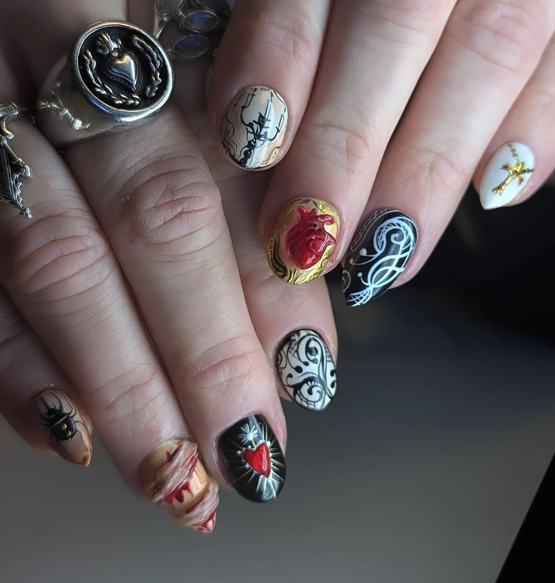 Mixed Halloween Character and Symbol Nails — DTD97n_jNcqNail art by abbi.webp