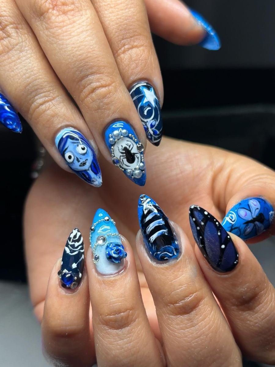 Blue Halloween Nails with Graphic Character Art — DPswFVtDTbmHenko.jpg