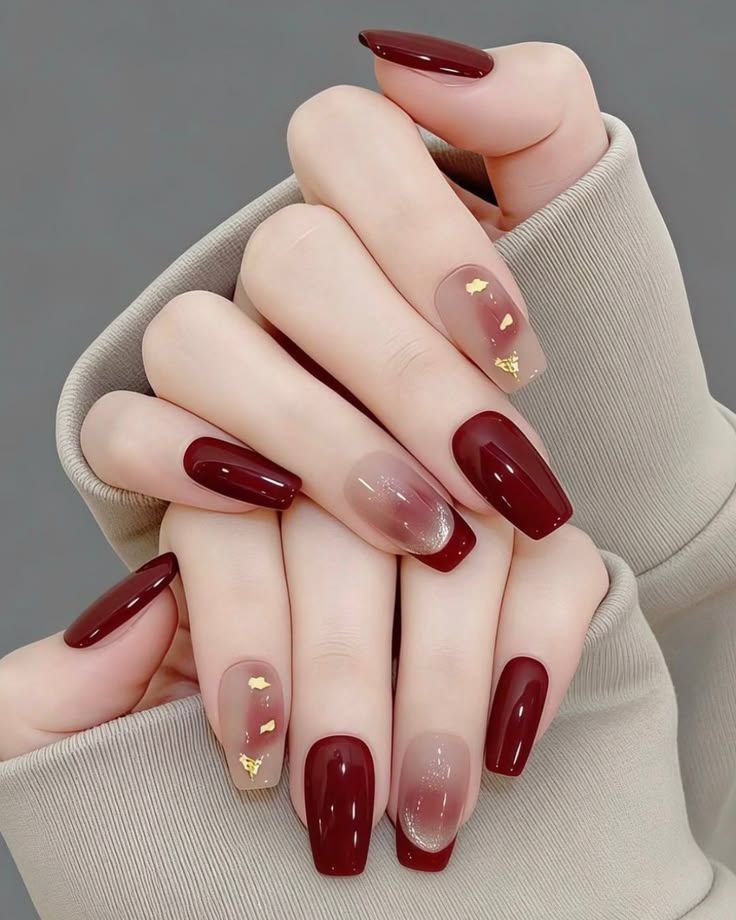 Burgundy and Nude Glossy Almond Nails