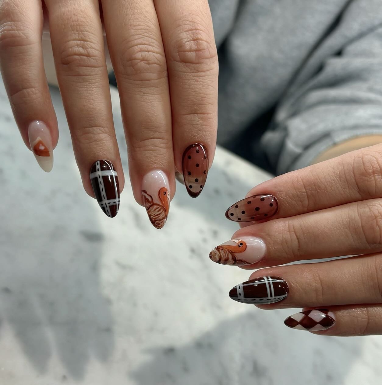 Brown, Black, and Plaid Almond Nails