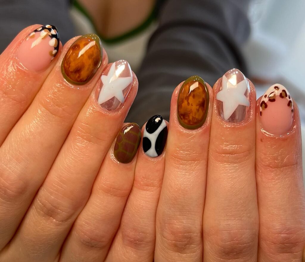 Mixed Brown, Green, and Pink Swirl Nails