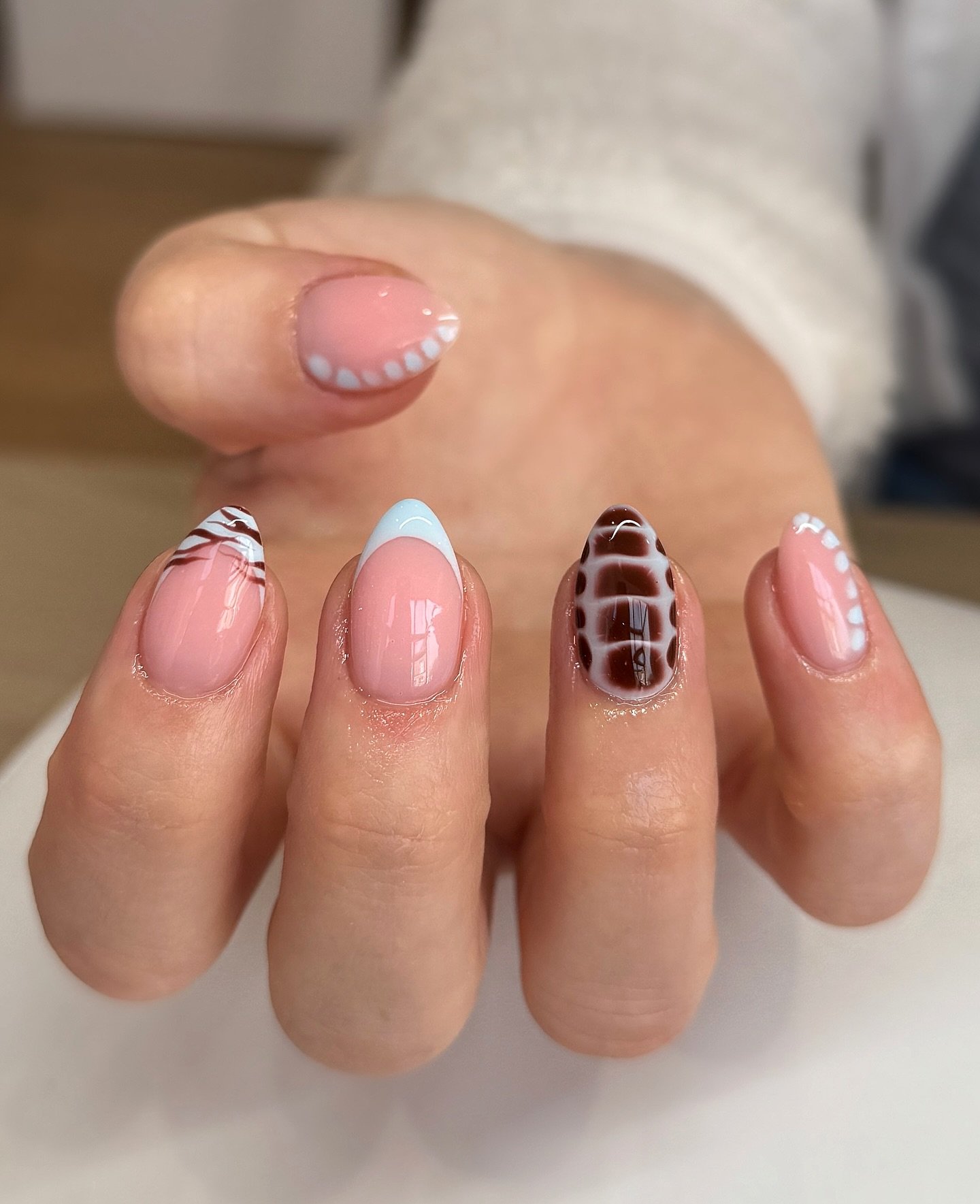 Soft Pink Nails with Brown Plaid Accent