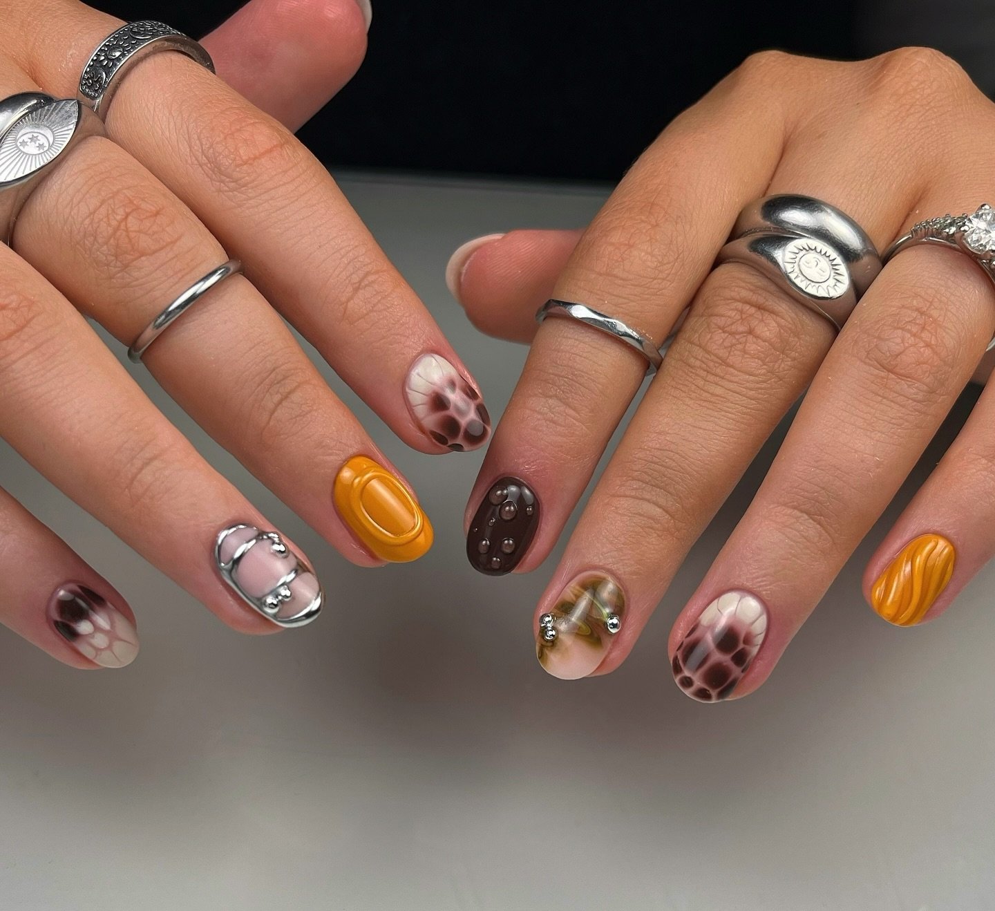 Brown, Orange, and Neutral Patchwork Nails