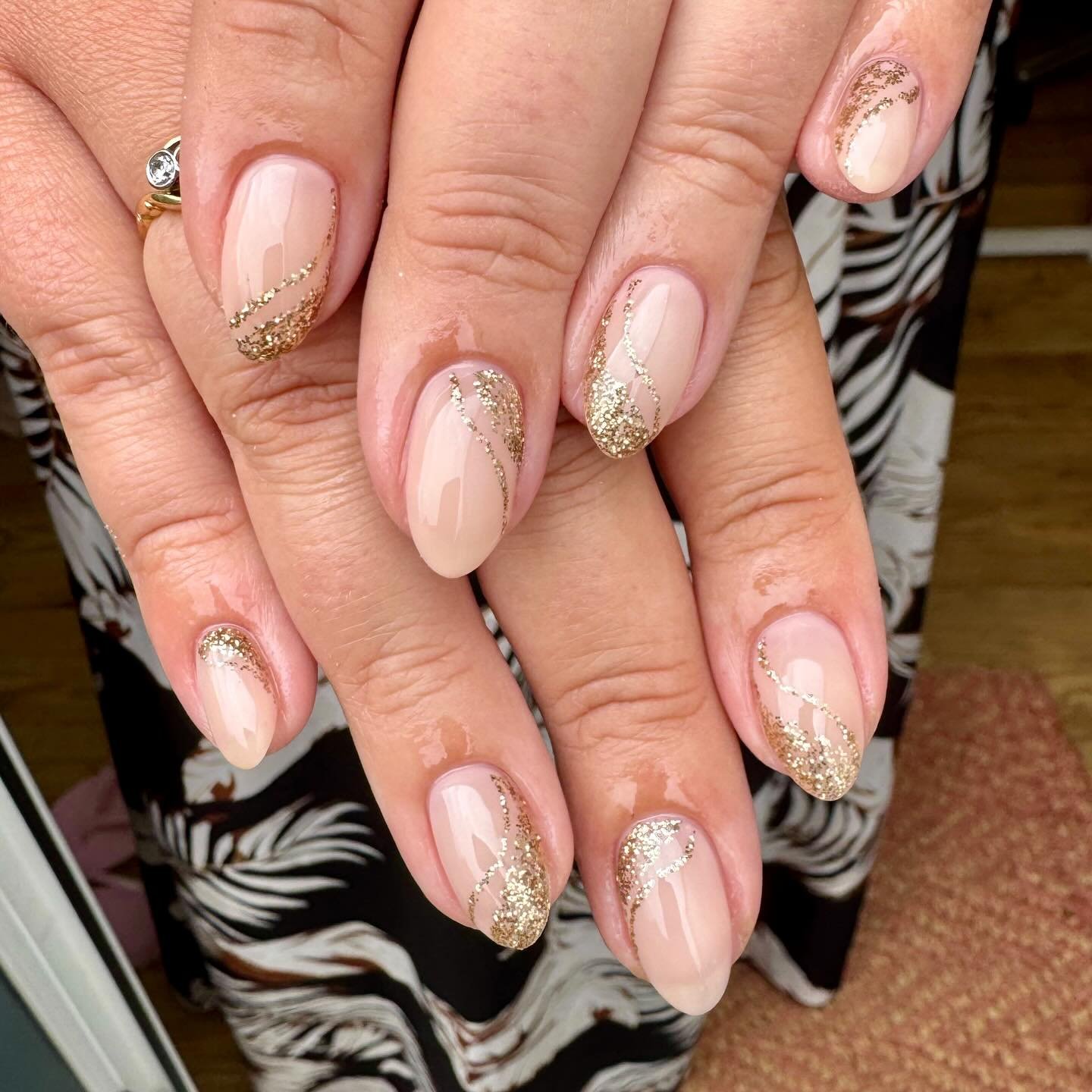 Sheer Pink Oval Nails with Fine Gold Glitter Tips