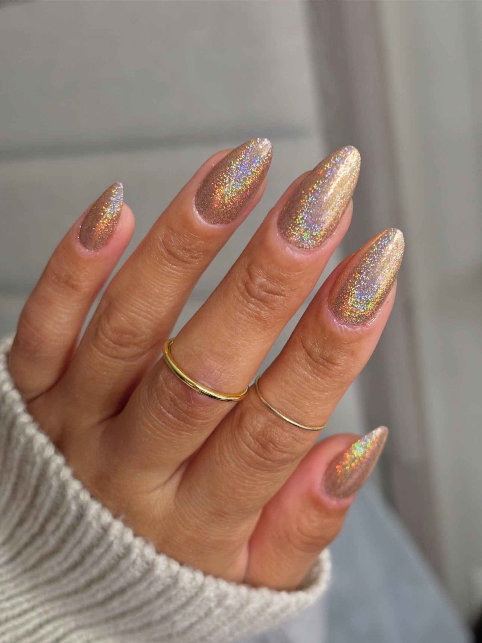 Long Almond Nails with Iridescent Gold Shimmer