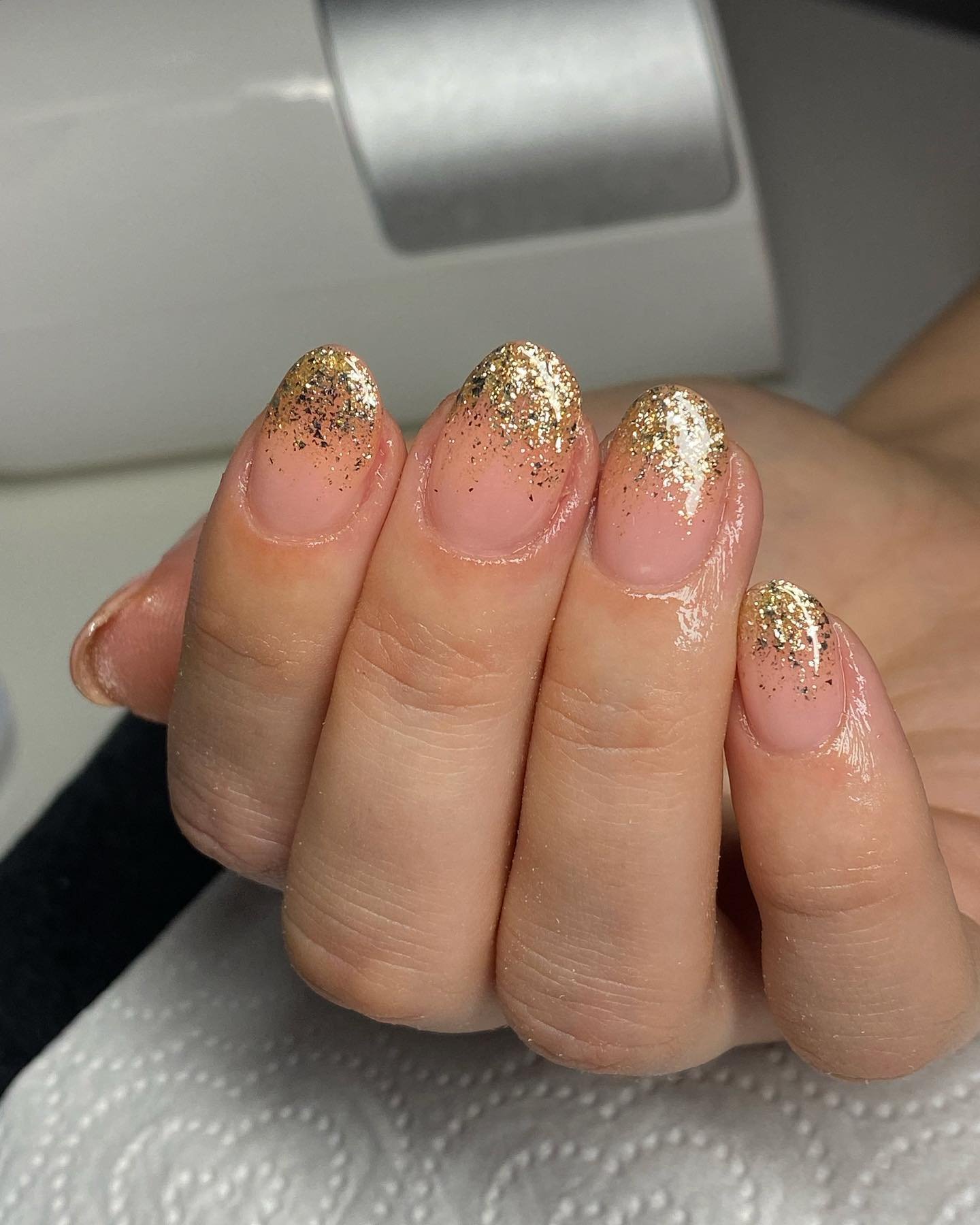 Sheer Nude Nails with Soft Gold Glitter Tips