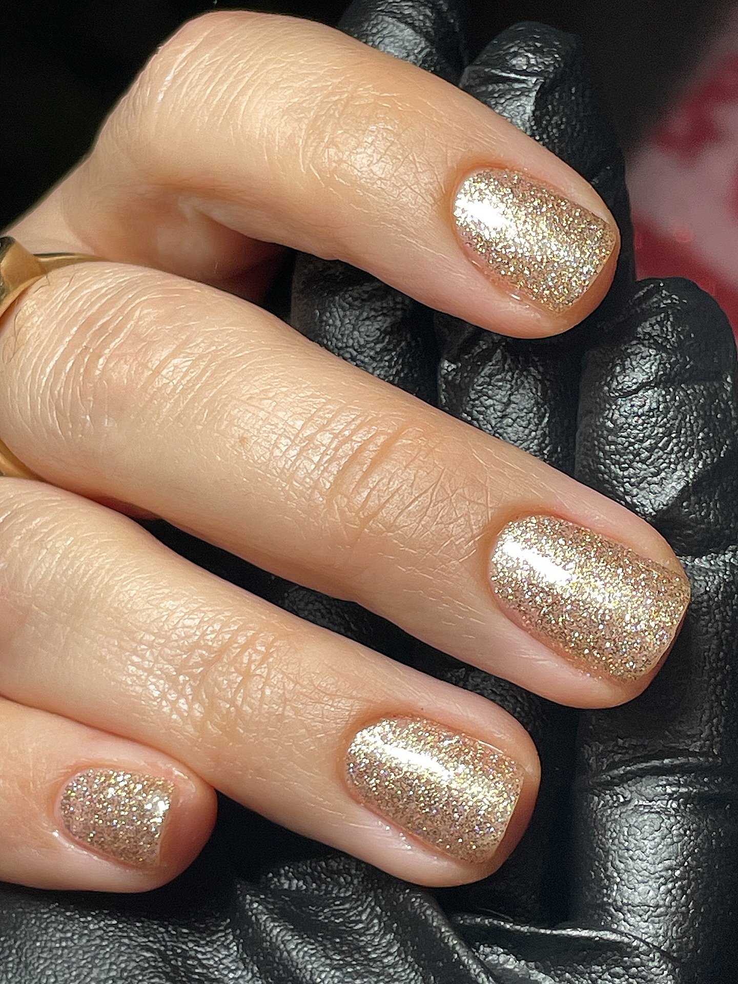 Short Rounded Nails with Fine Gold Glitter