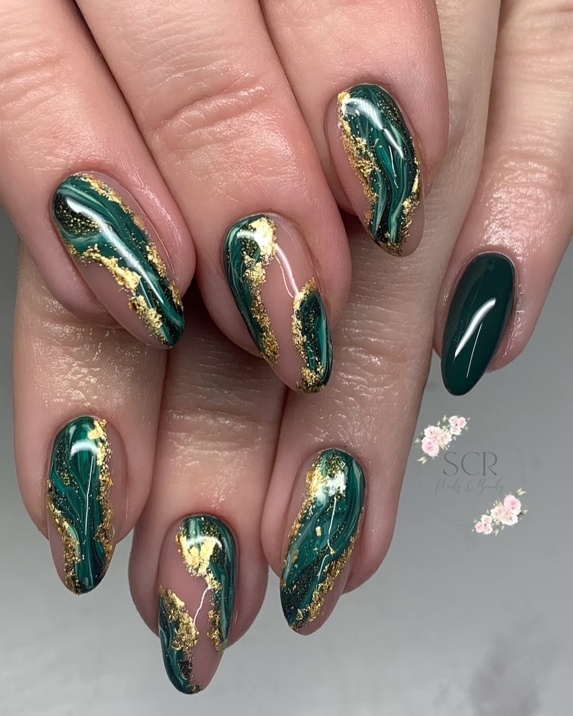 Deep Green Stiletto Nails with Gold Botanical Details