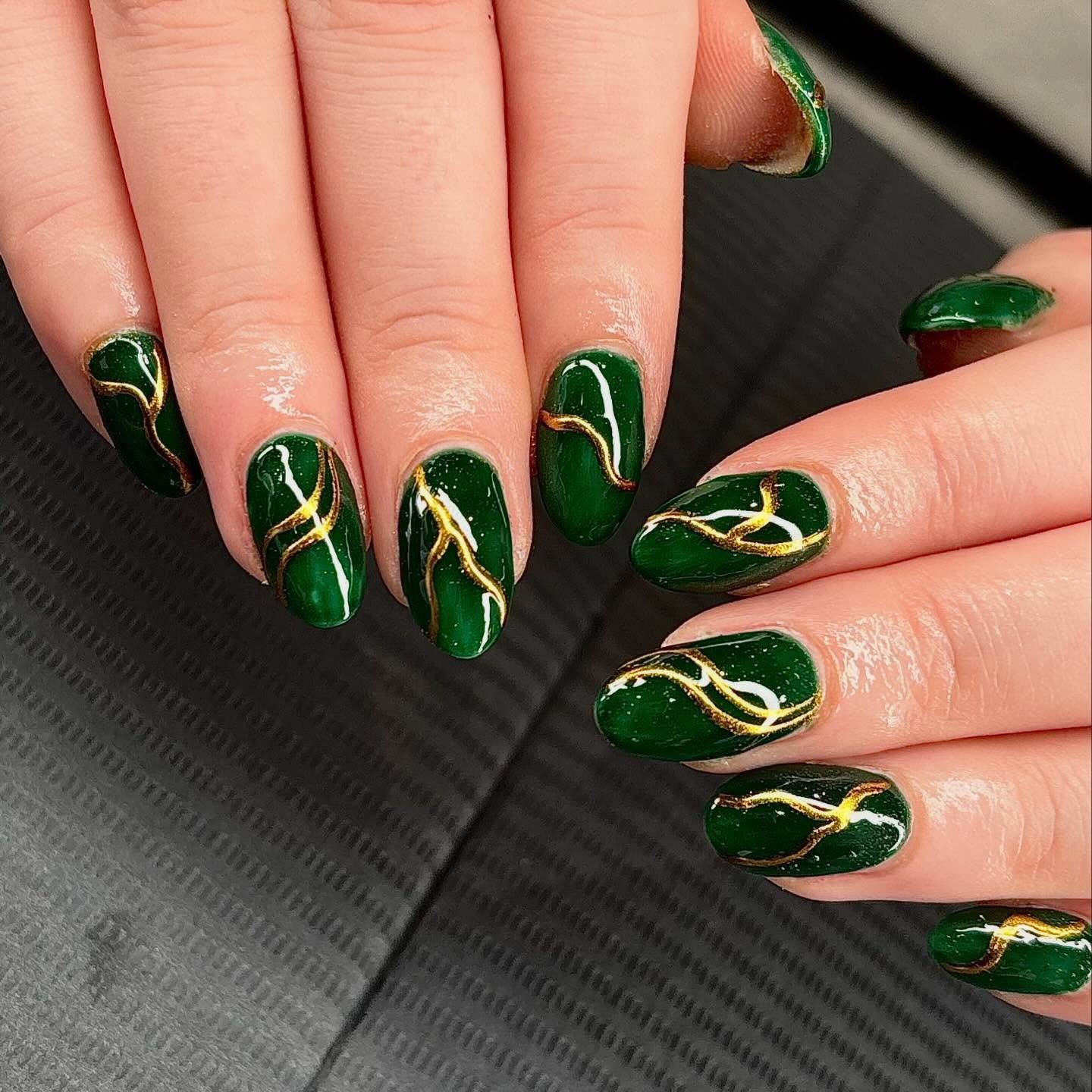 Olive Green Nails with Delicate Gold Leaf Accents
